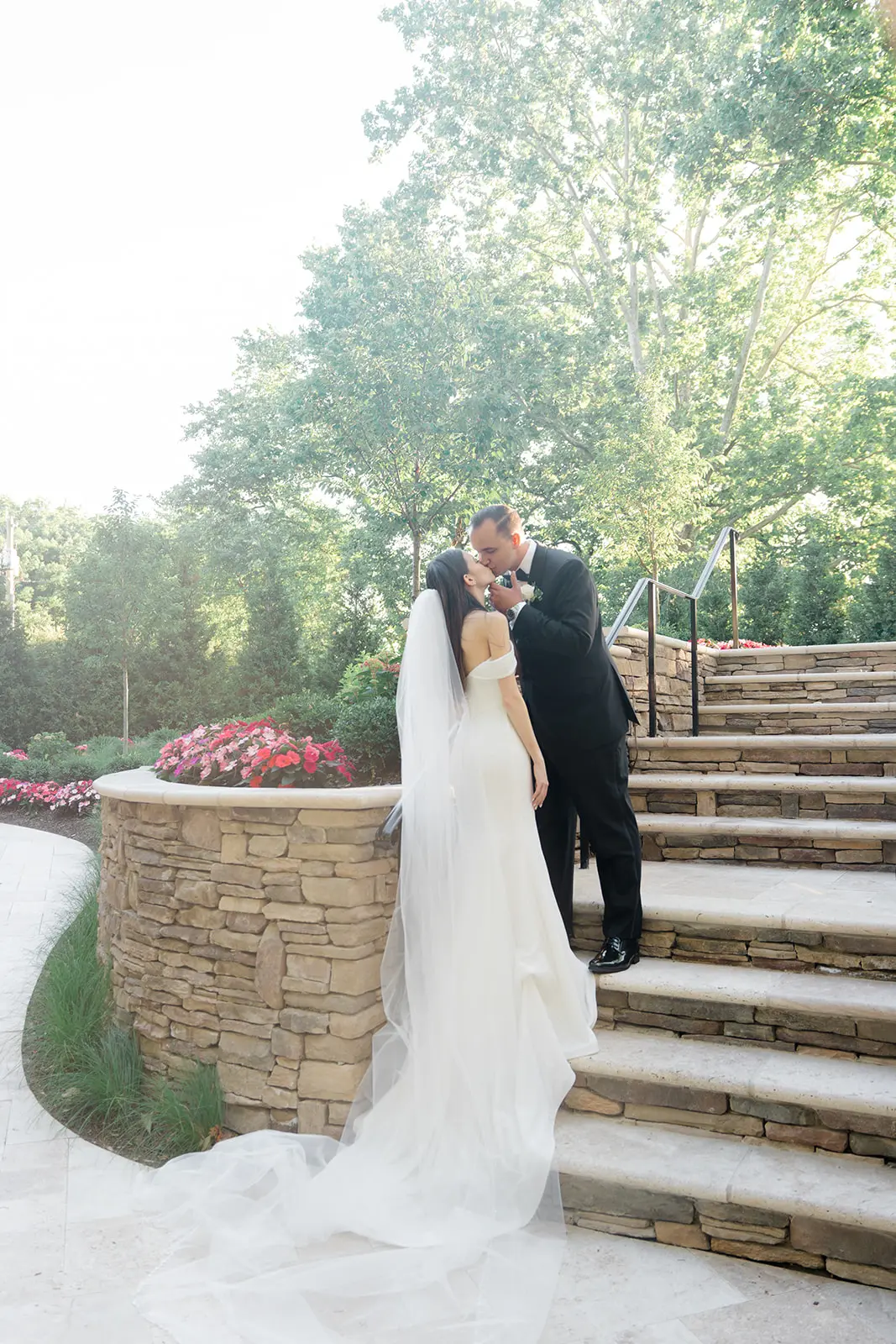 Bride wearing Anniston Lane by Maggie Sottero kissing her husband