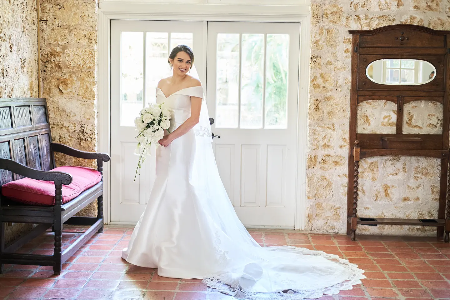 bride in off the shoulder elegant wedding dress