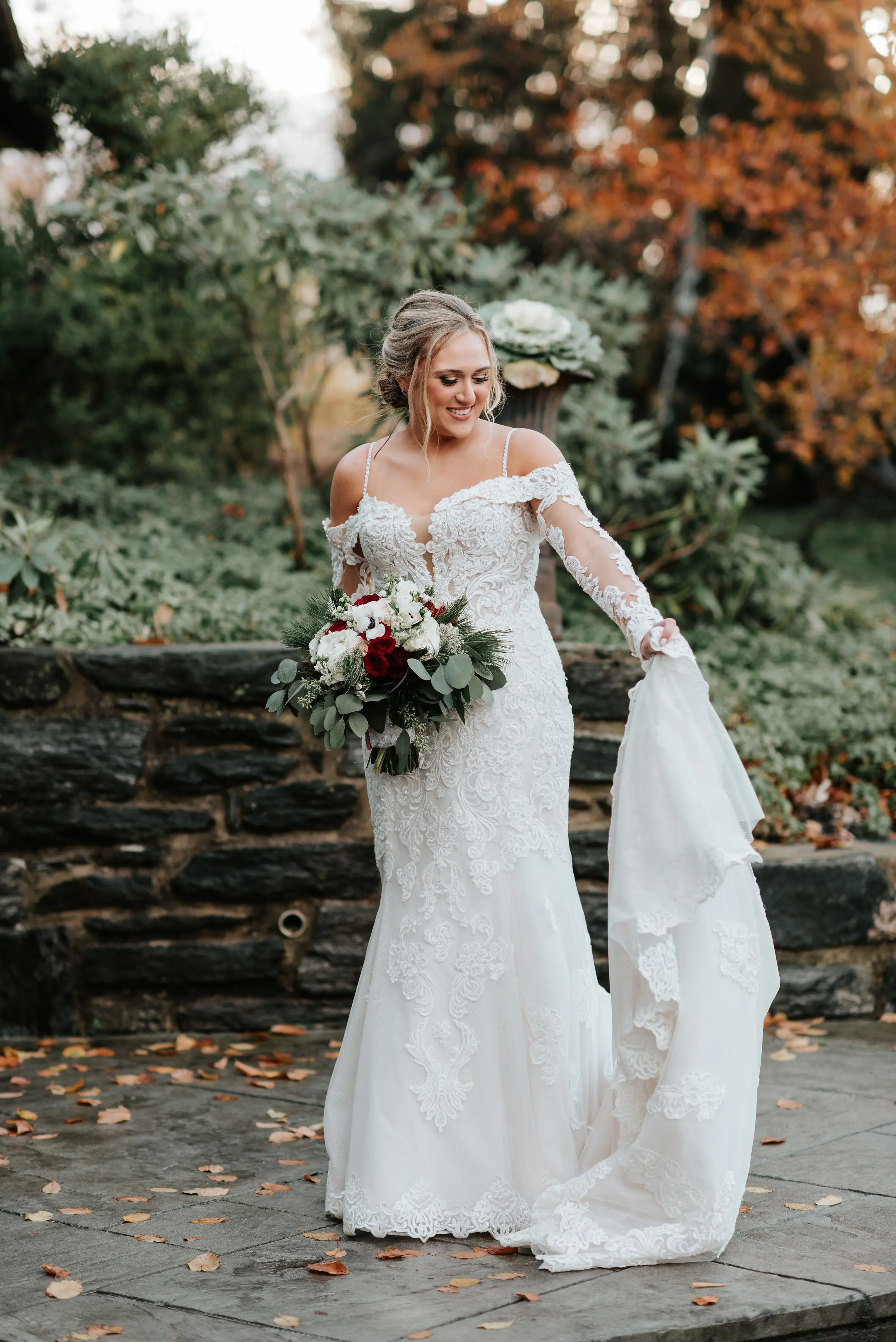 Bride in Sparkly Lace Fit-and-Flare Bridal Dress with Off-the-Shoulder Sleeves Called Fiona by Maggie Sottero