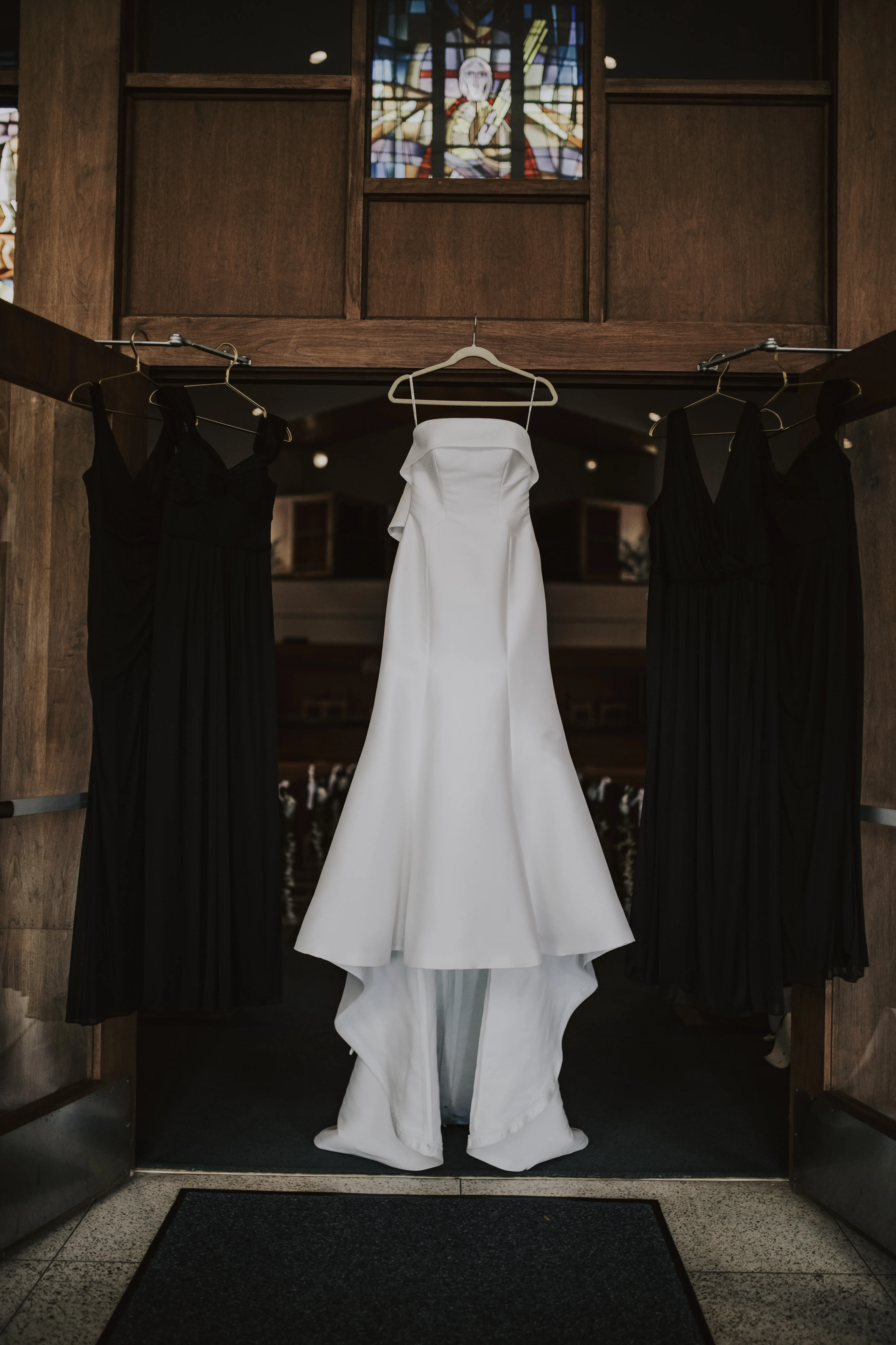 Mitchell wedding dress by Maggie Sottero hanging up