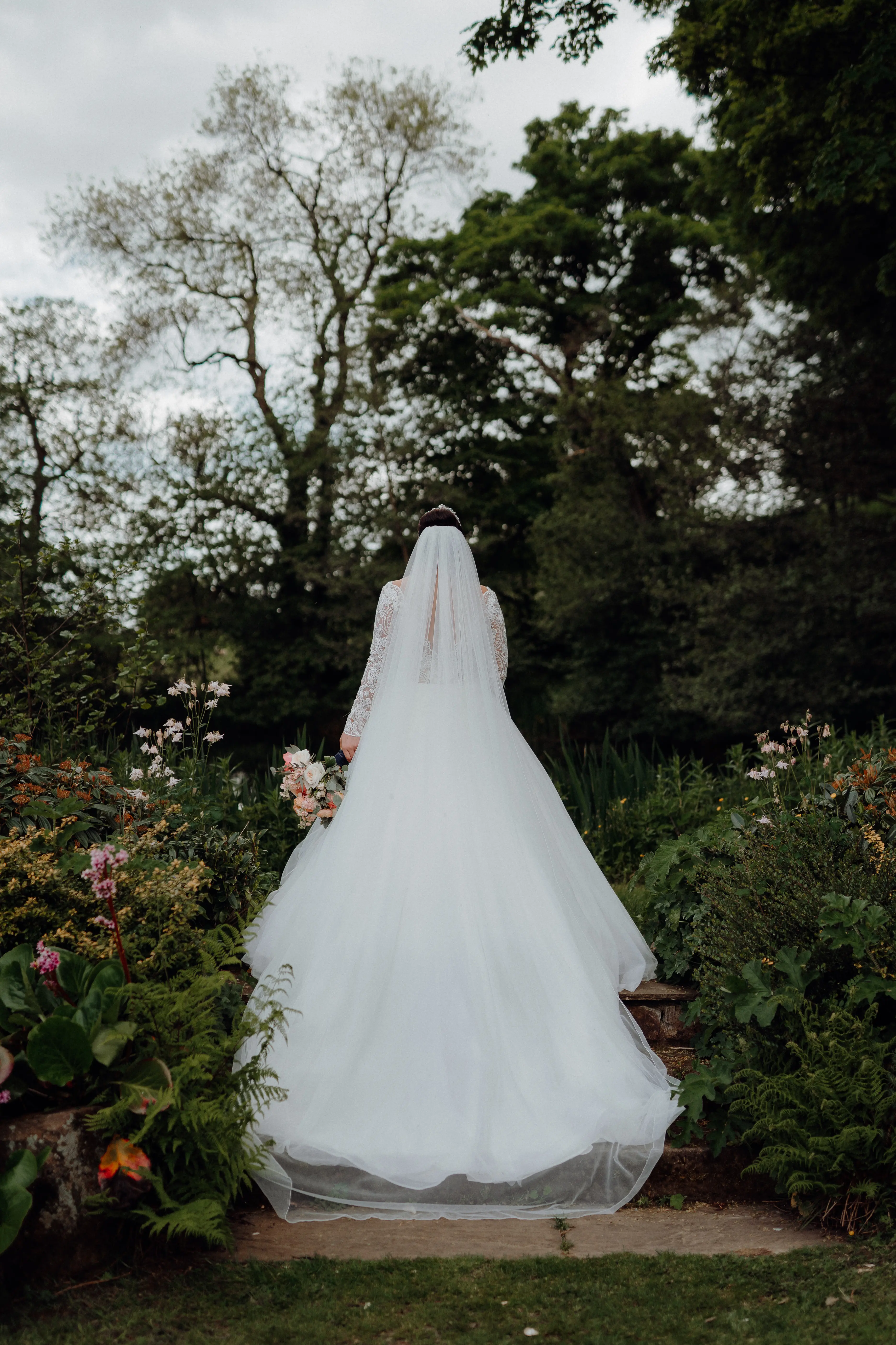 Bride In Long Sleeve Lace Ball Gown Wedding Dress Called Mallory Dawn By Maggie Sottero With Veil