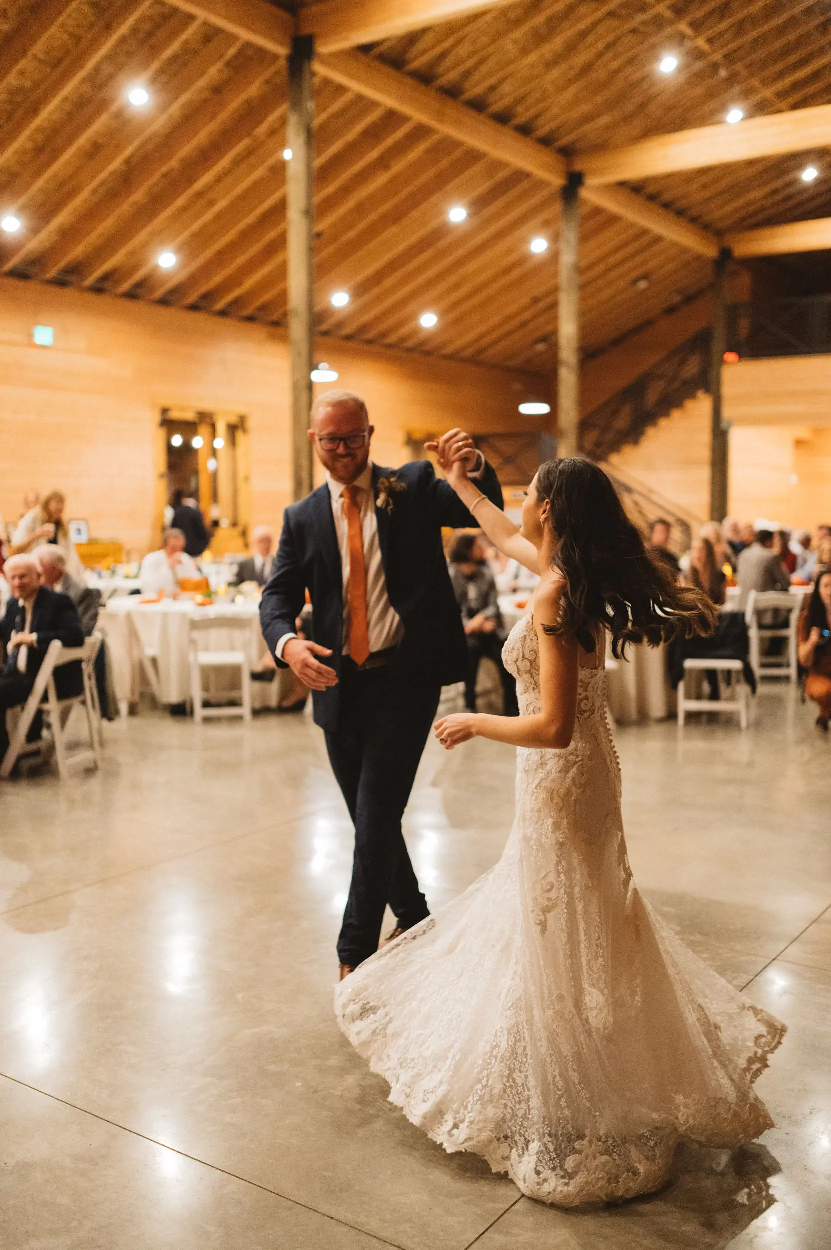 Bride Wearing Lace A-Line Wedding Dress Called Tuscany Lane By Maggie Sottero Dancing With Groom