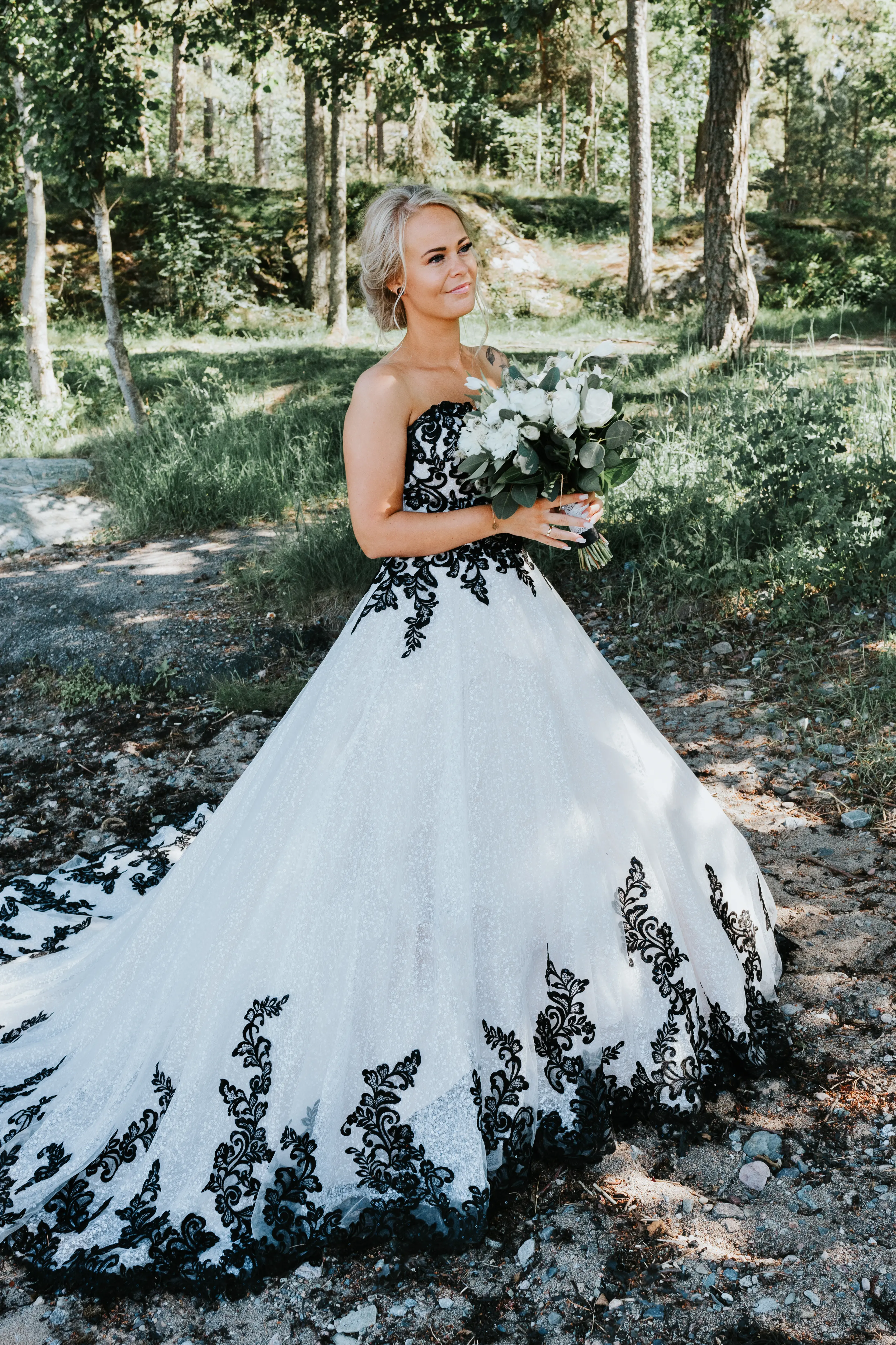 Bride Wearing Ballgown With Black Lace Detail Called Tristyn By Maggie Sottero