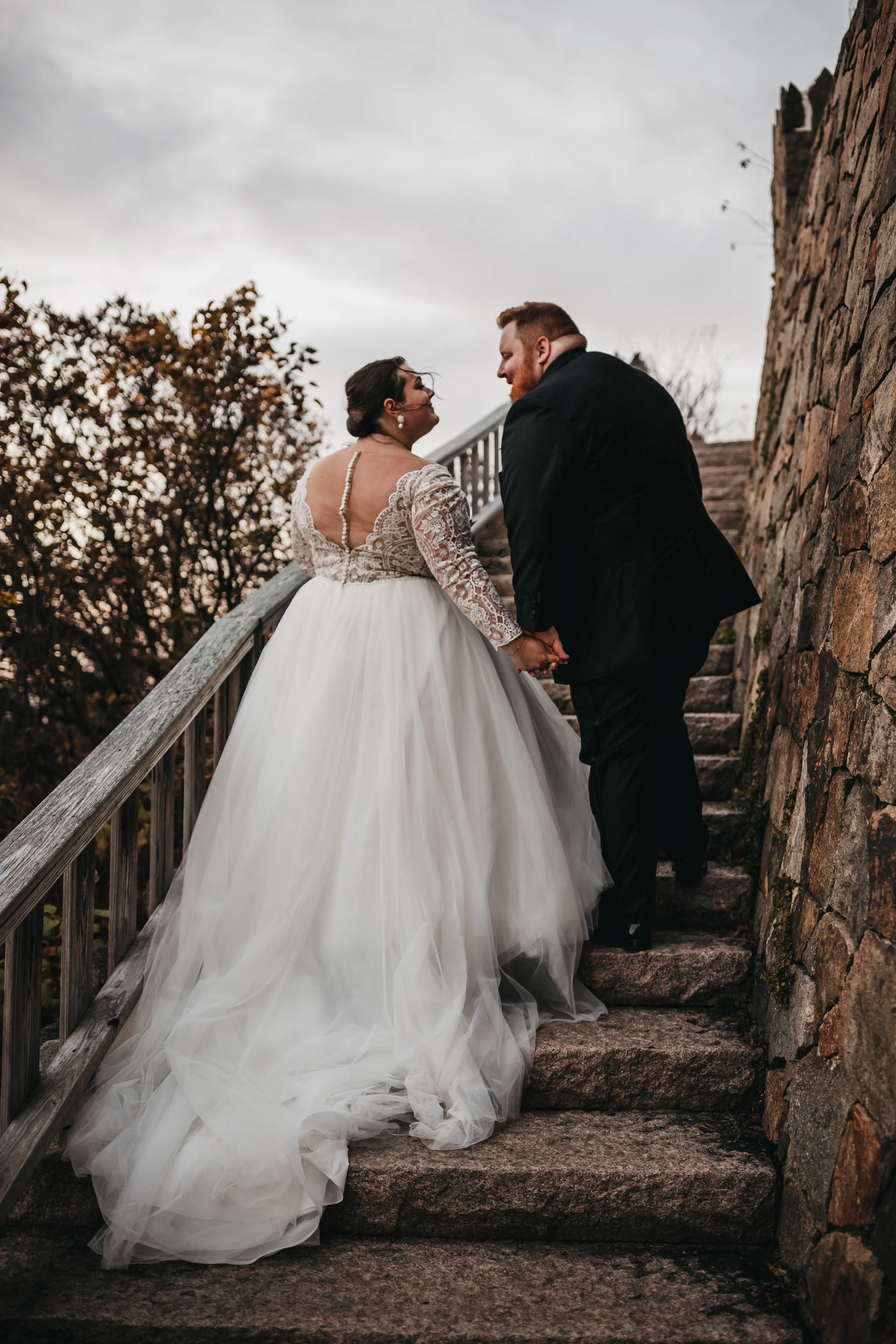 Bride In Lace Wedding Dress Called Mallory Dawn By Maggie Sottero With Illusion Lace Back With Groom