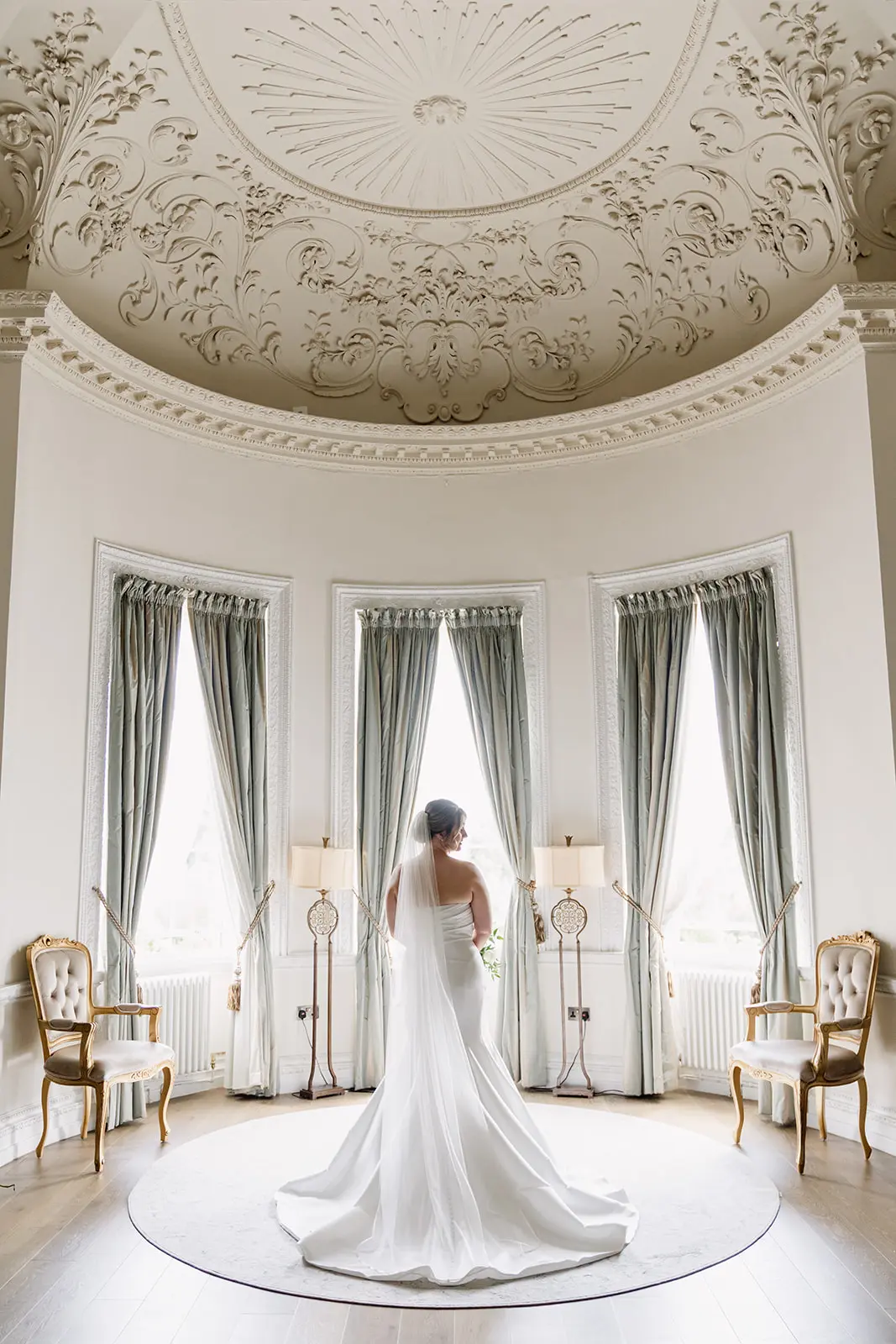 Bride Wearing Modern Wedding Dress Called Marilyn By Sottero And Midgley In A Brightly Lit Room