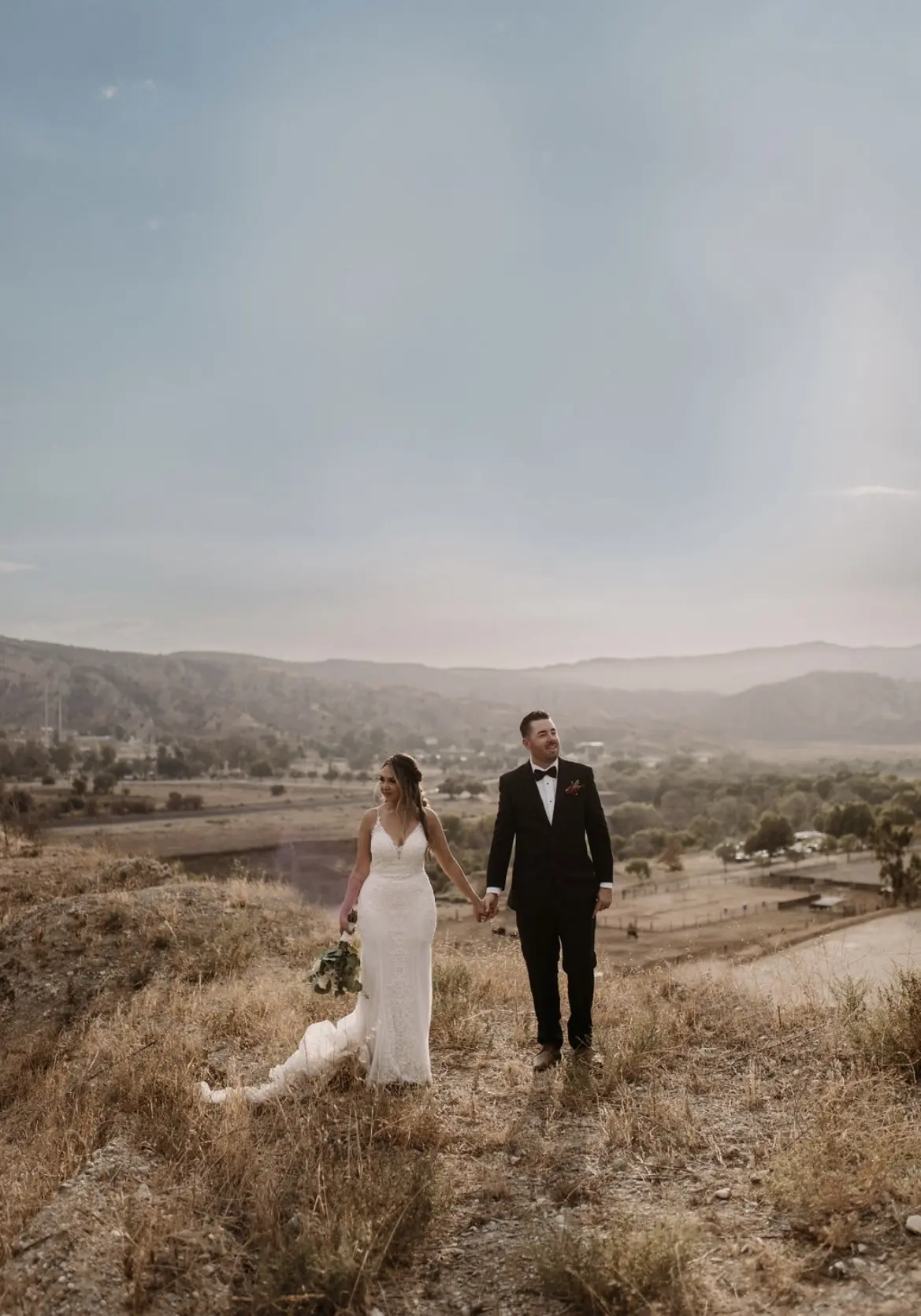 Bride In Beaded Fit-And-Flare Wedding Dress Called Barrett By Sottero And Midgley With Groom
