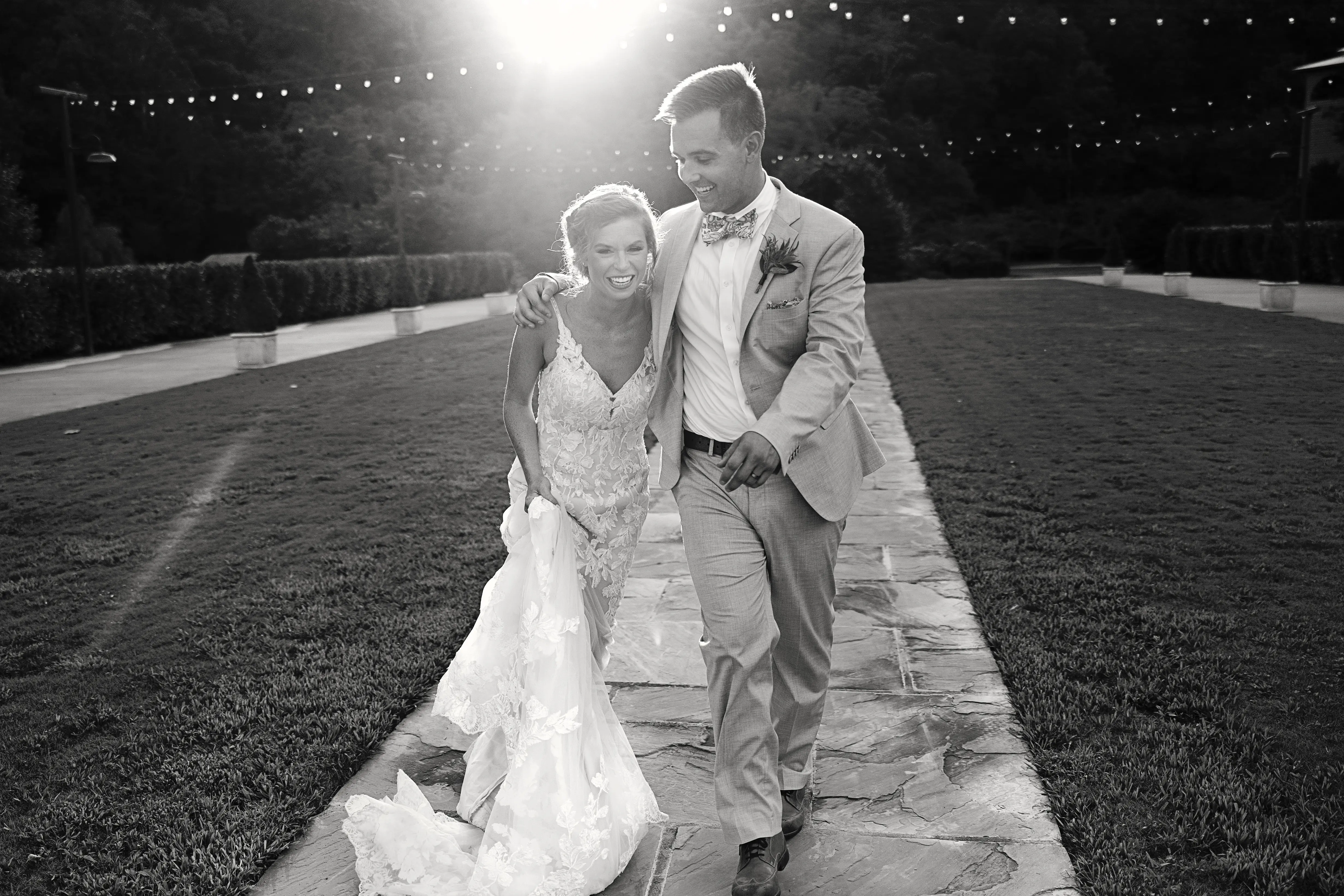 Bride In Lace Fit-And-Flare Wedding Dress Called Giana By Maggie Sottero With Groom