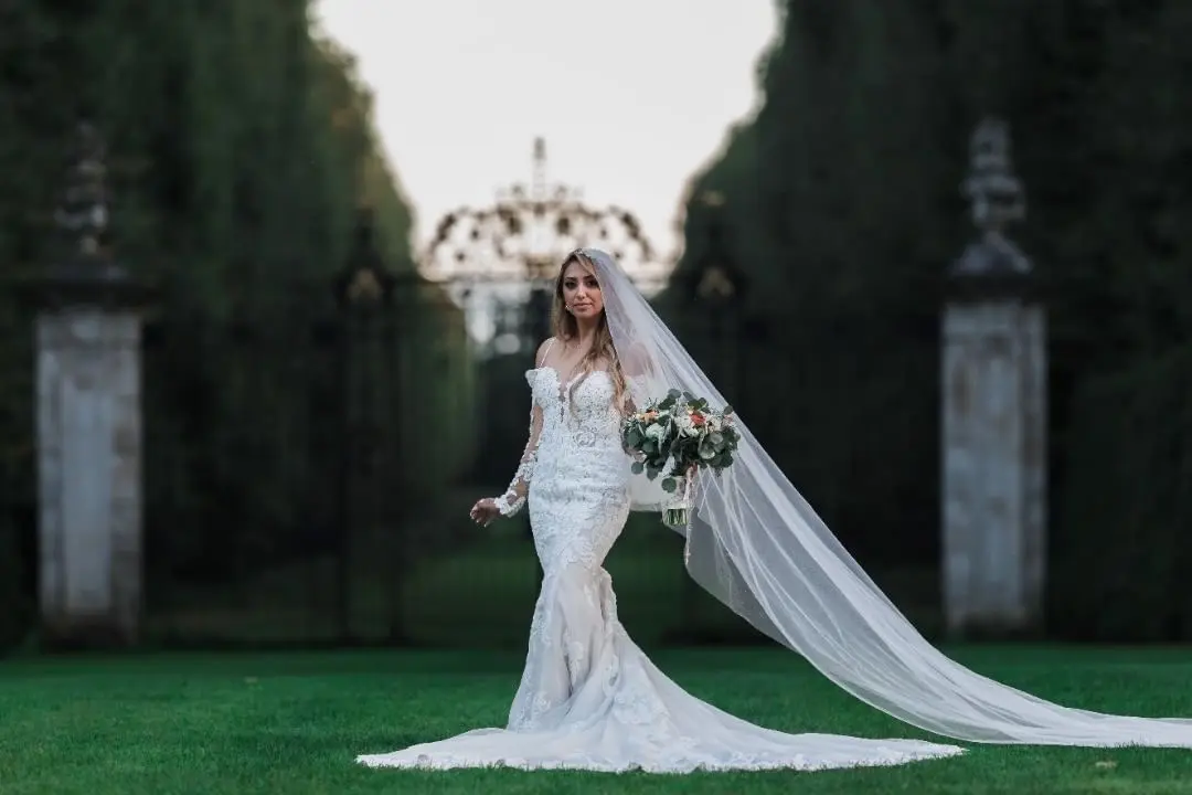 Bride Wearing Sparkly Fit-And-Flare Wedding Dress Called Fiona By Maggie Sottero