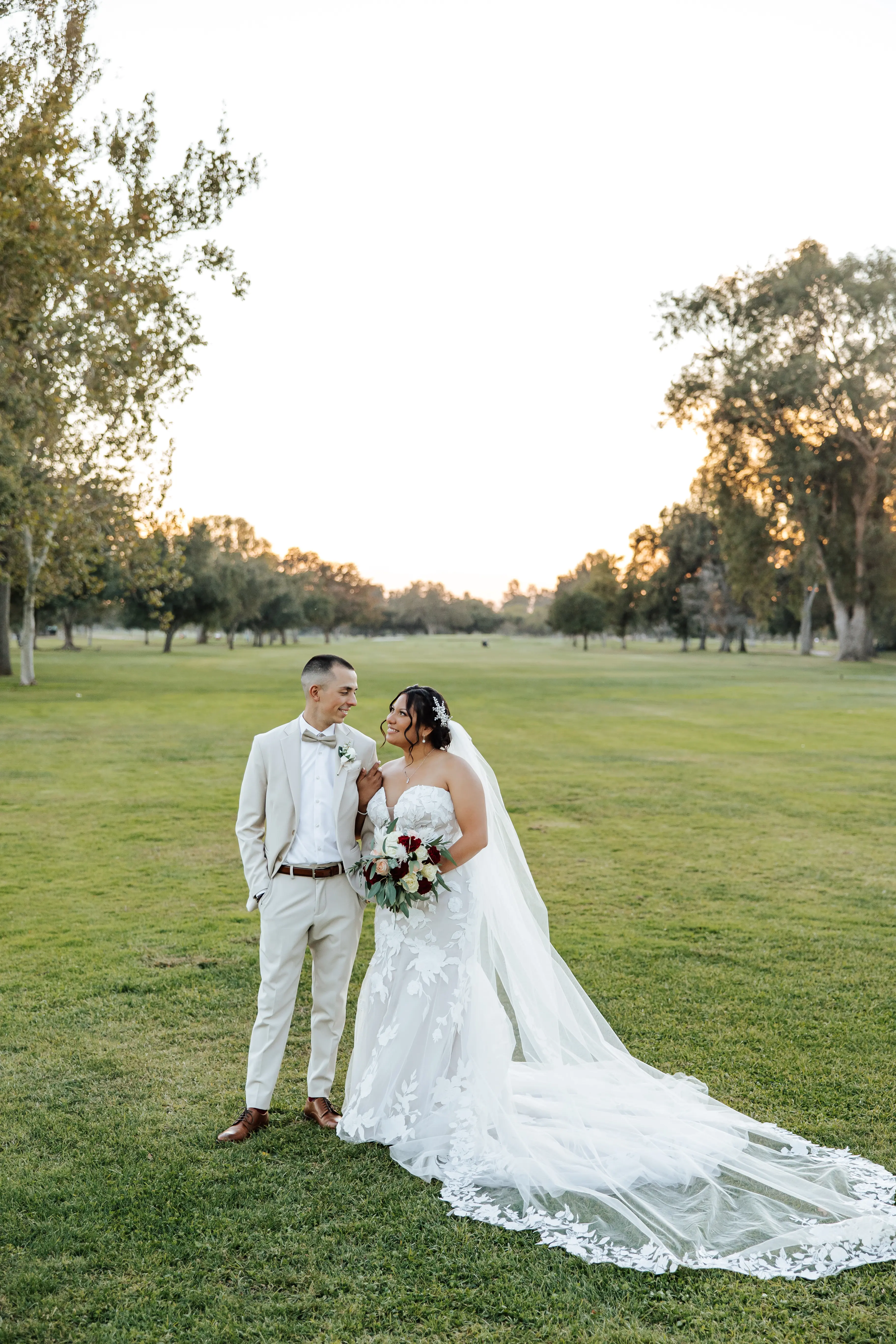 Real Bride in Strapless Mermaid Bridal Gown with Oversize Floral Lace Motifs Over Sparkle Tulle Called Hattie by Rebecca Ingram