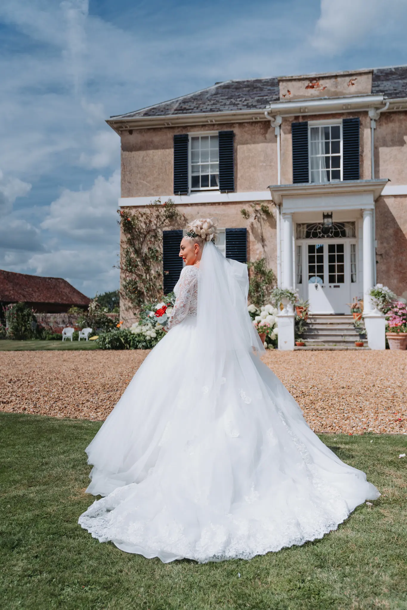 Bride Wearing Elegant Long Sleeved Ball Gown Mallory Dawn By Maggie Sottero
