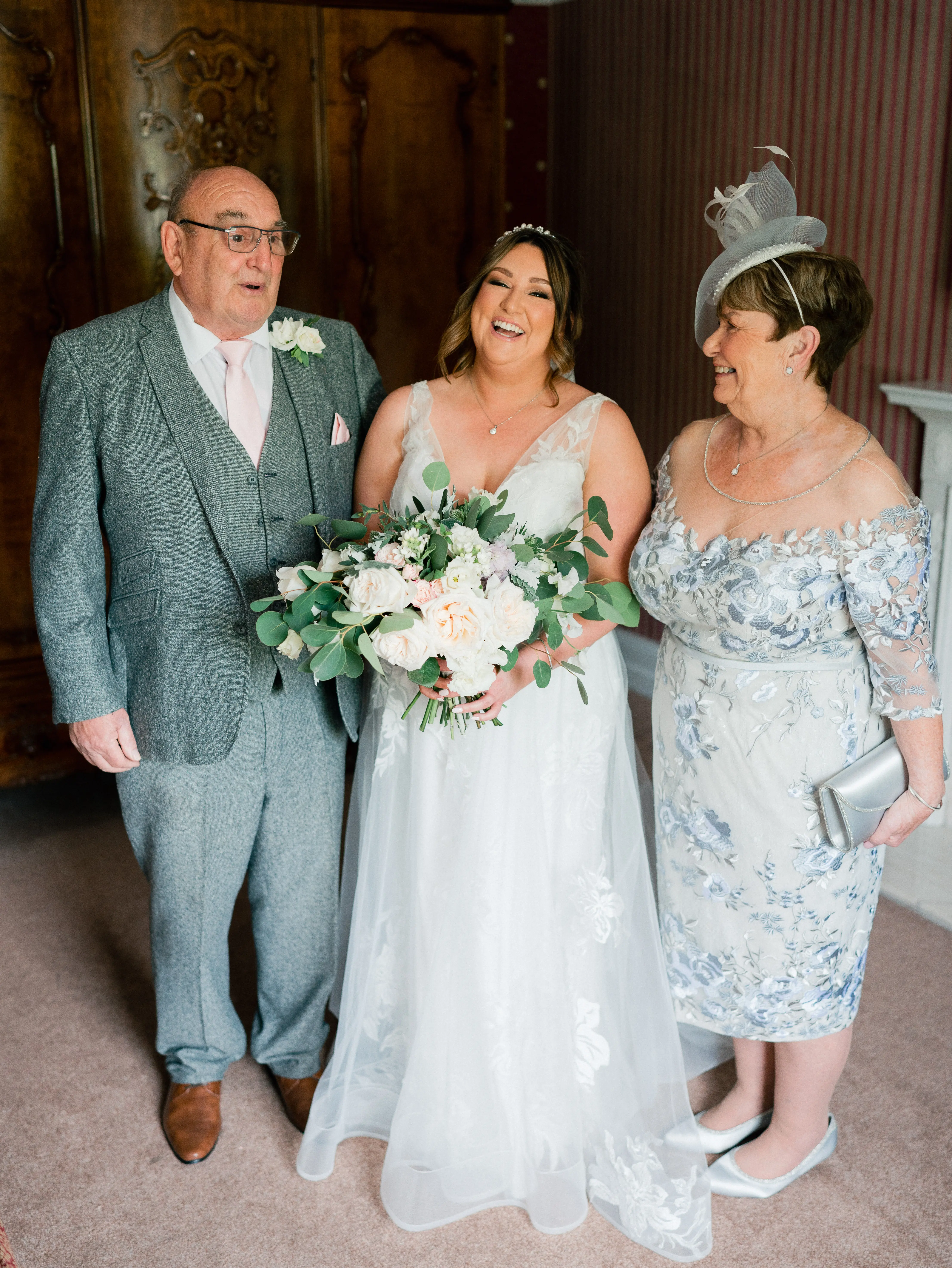 Real Bride in A-Line Wedding Gown with Lace Motifs Over Tulle and Beaded Lace Bodice Embellished with Swarovski Crystals Called Priscilla by Rebecca Ingram