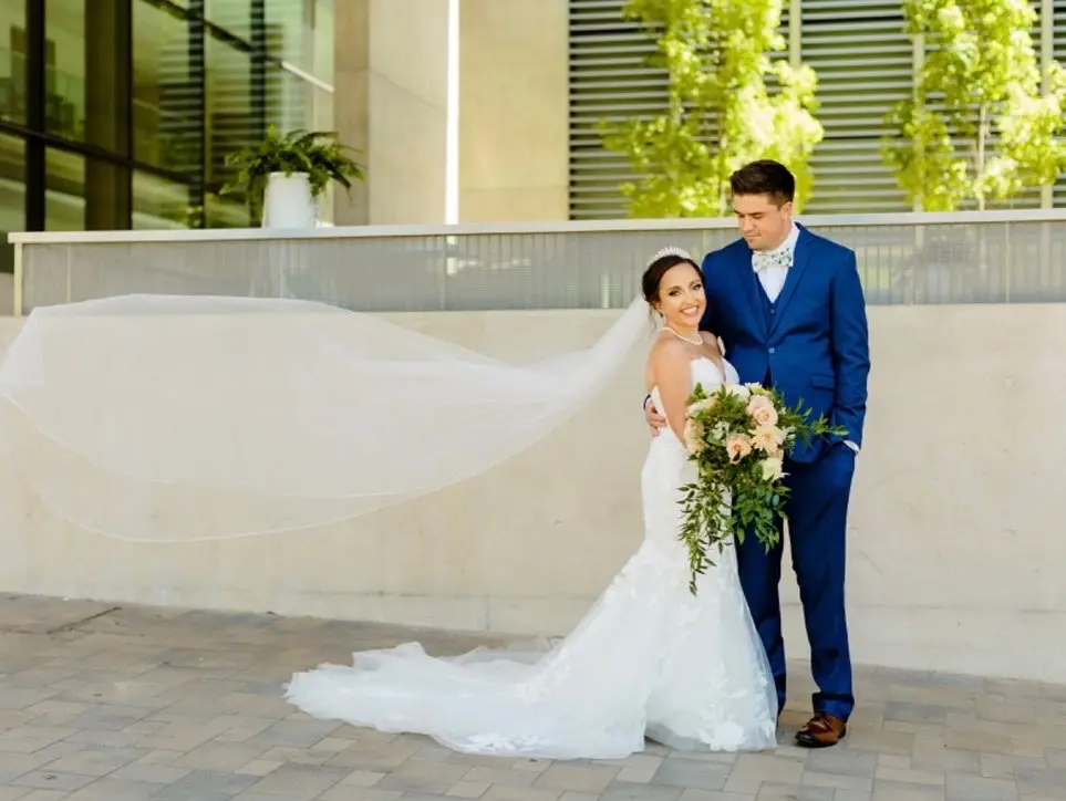 Bride In Mermaid Wedding Dress Called Hattie By Rebecca Ingram With Groom