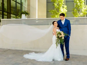 Bride In Mermaid Wedding Dress Called Hattie By Rebecca Ingram With Groom