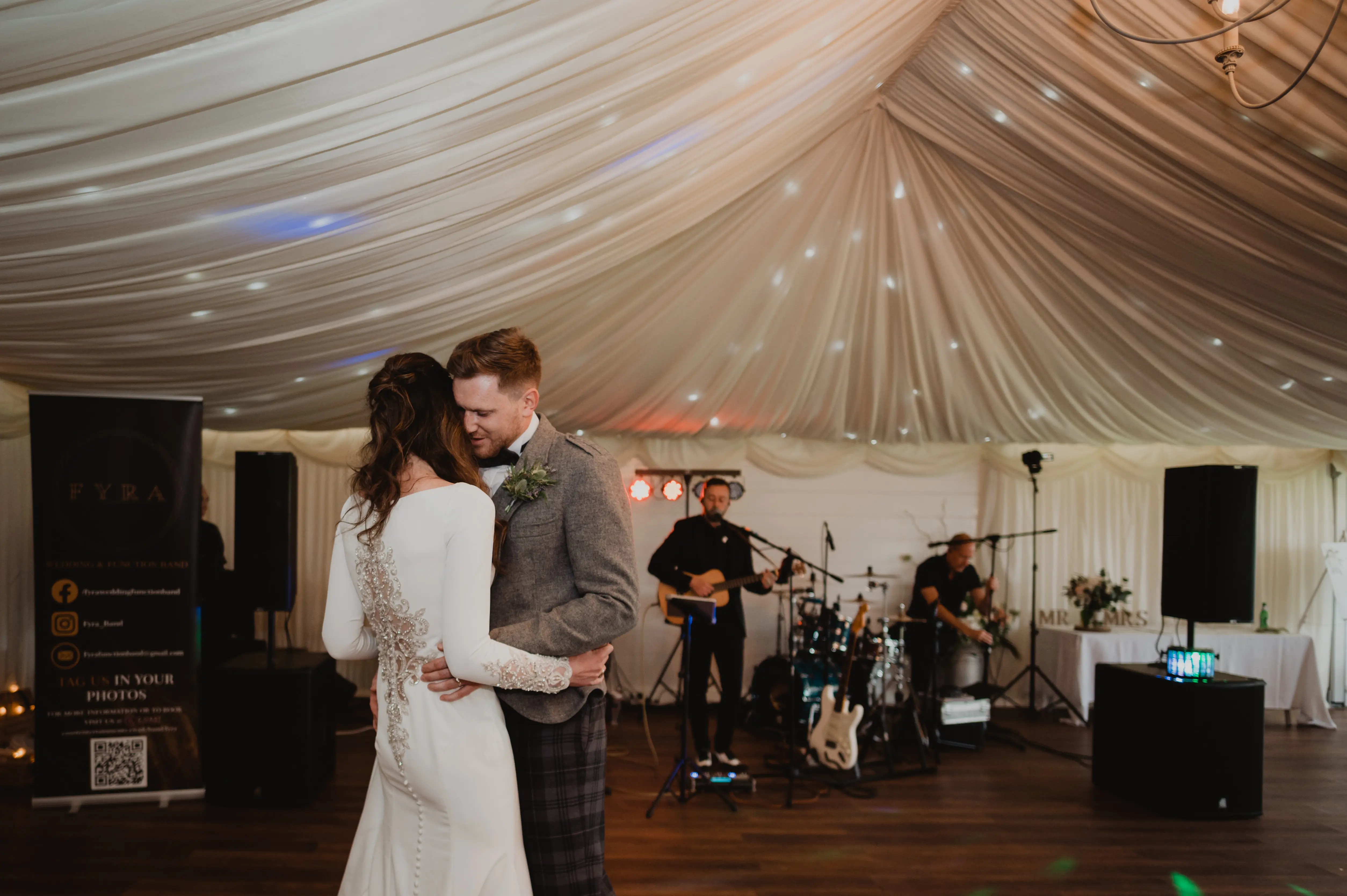 Real Bride in Crepe Fit-and-Flare Wedding Dress with a Statement Back of Beaded Illusion Embroidery Featuring Swarovski Crystals Called Aston by Sottero & Midgely