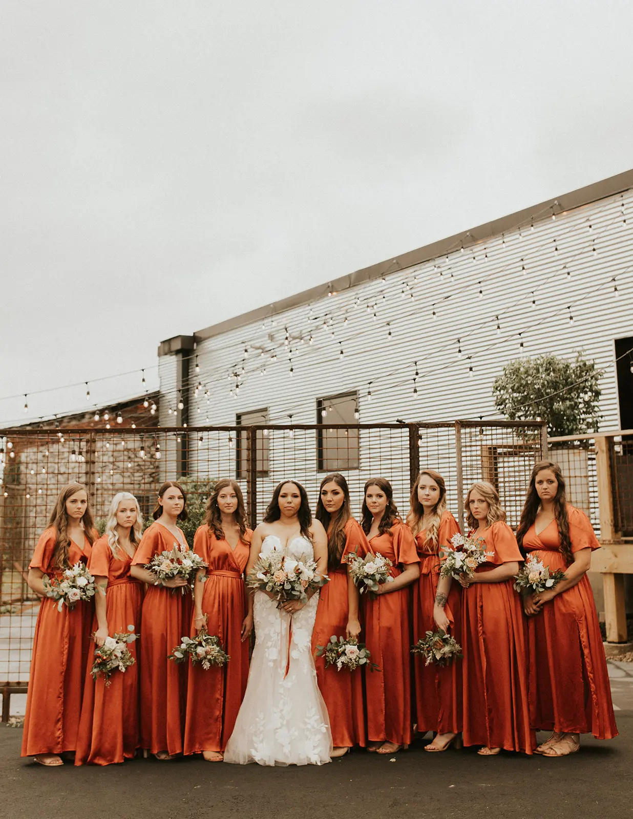Bride With Bridesmaids Wearing Wedding Dress Called Hattie by Rebecca Ingram