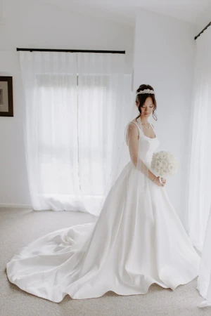 Bride In Satin A-Line Wedding Dress Called Selena By Maggie Sottero