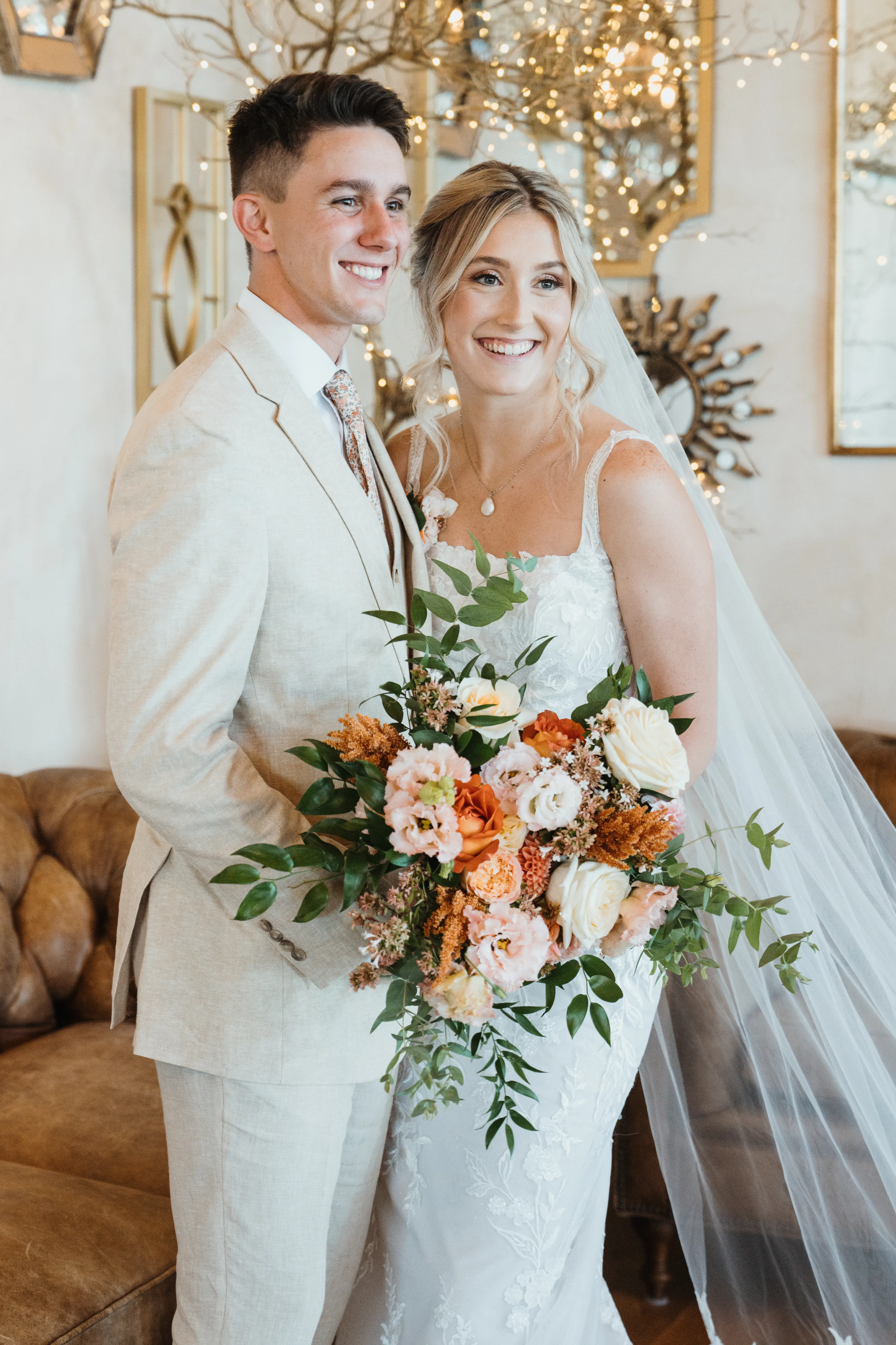 Bride wearing Albany wedding dress by Maggie Sottero with her husband