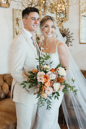 Bride wearing Albany wedding dress by Maggie Sottero with her husband