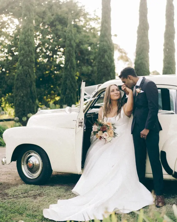 Bride in Mikado Ball Down Wedding Dress Selena by Maggie Sottero with Groom