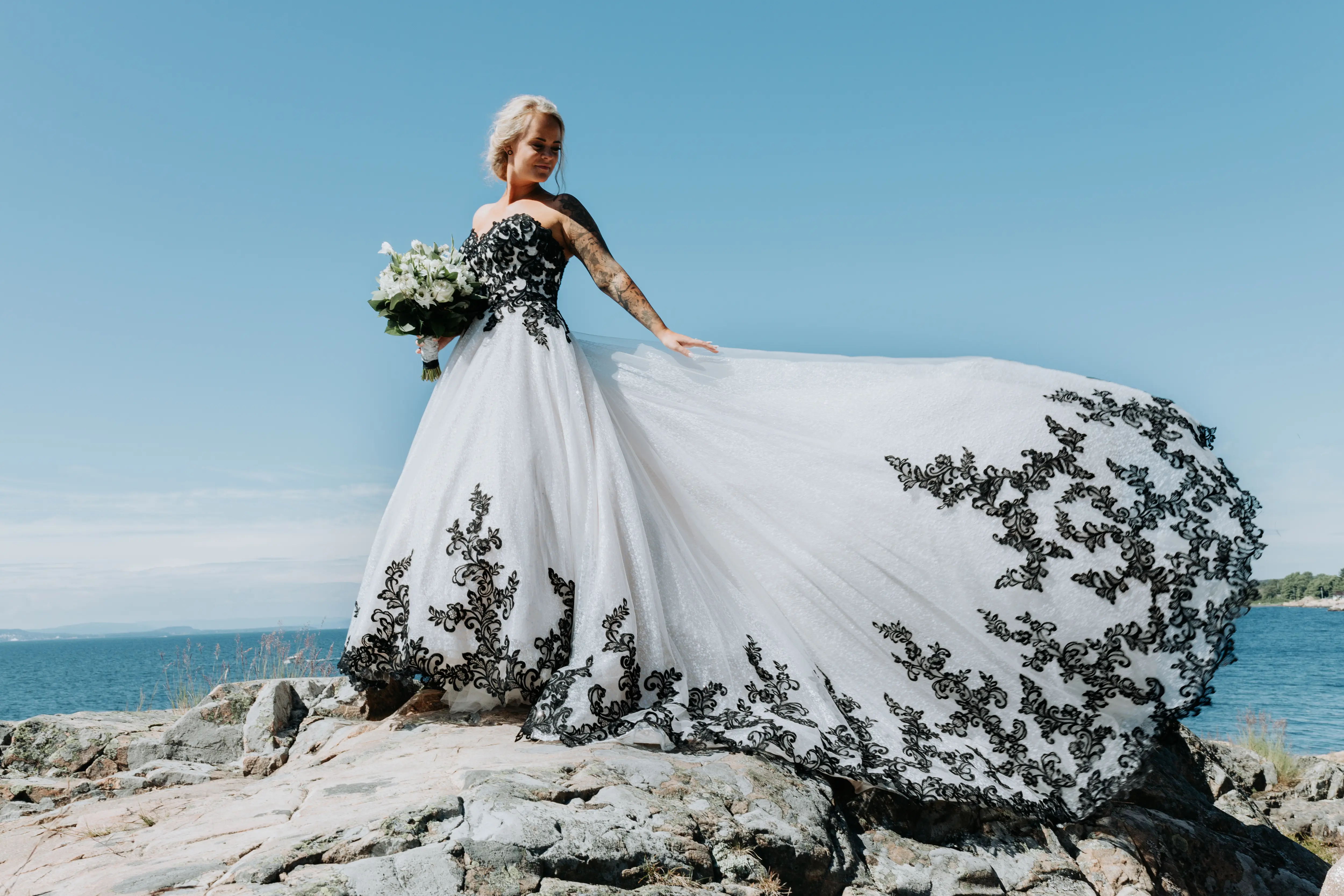 Bride Wearing Ballgown With Black Lace Detail Called Tristyn By Maggie Sottero