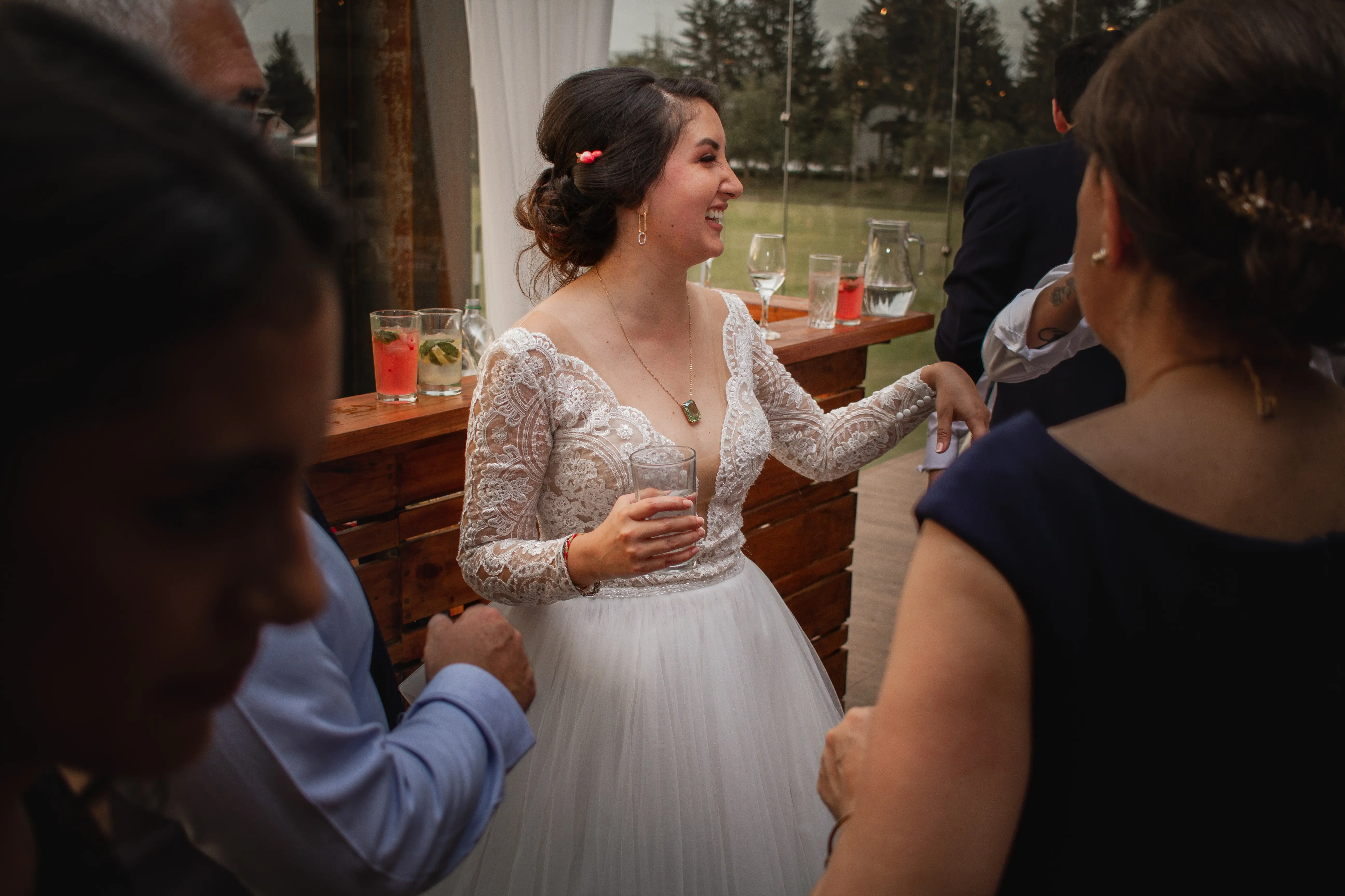 Bride in Long Sleeve Ball Gown Wedding Dress Named Mallory Dawn by Maggie Sottero Showing Off Her Ring