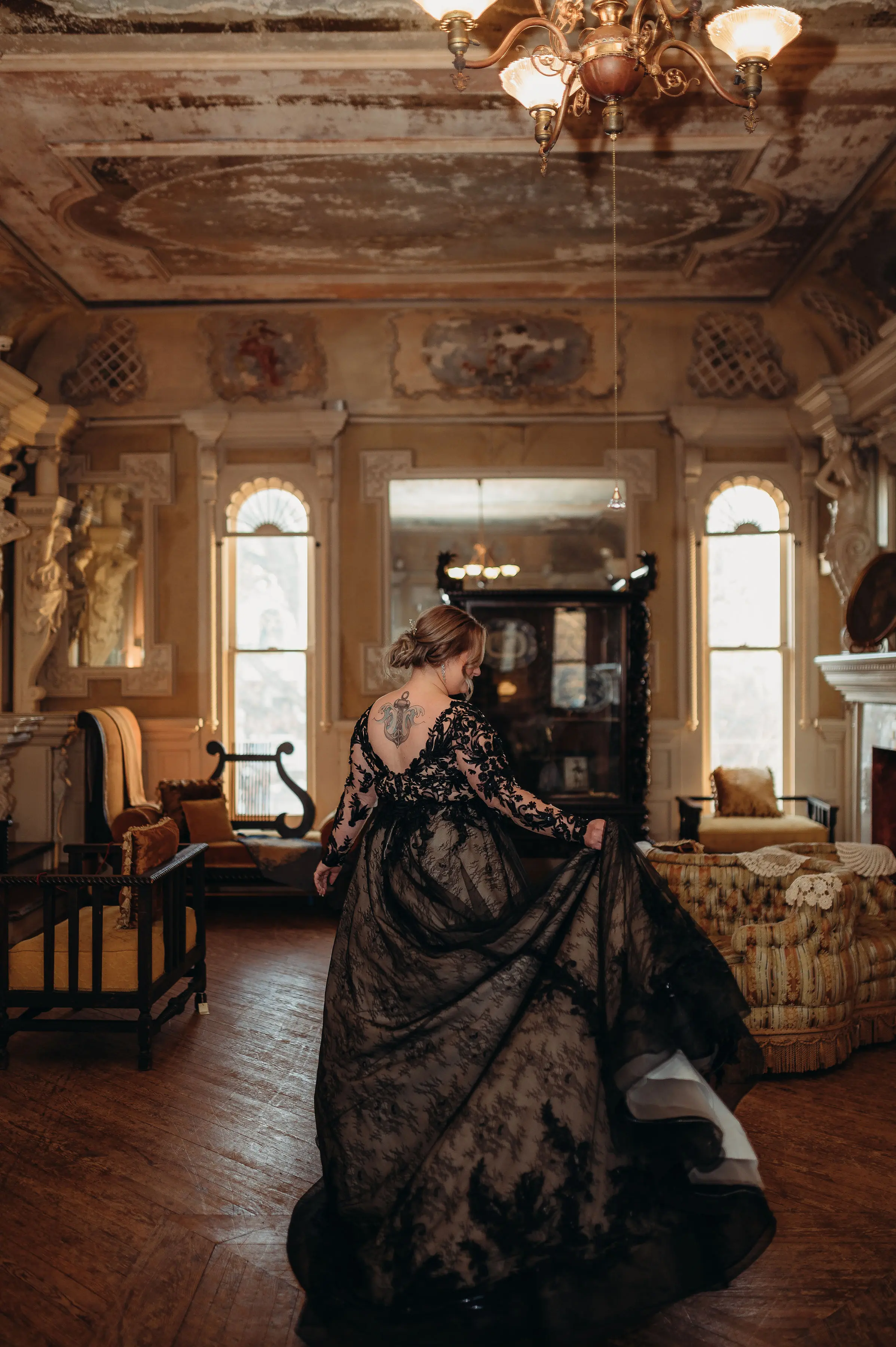 Bride In Long Sleeve Black Wedding Dress Called Zander By Sottero And Midgley