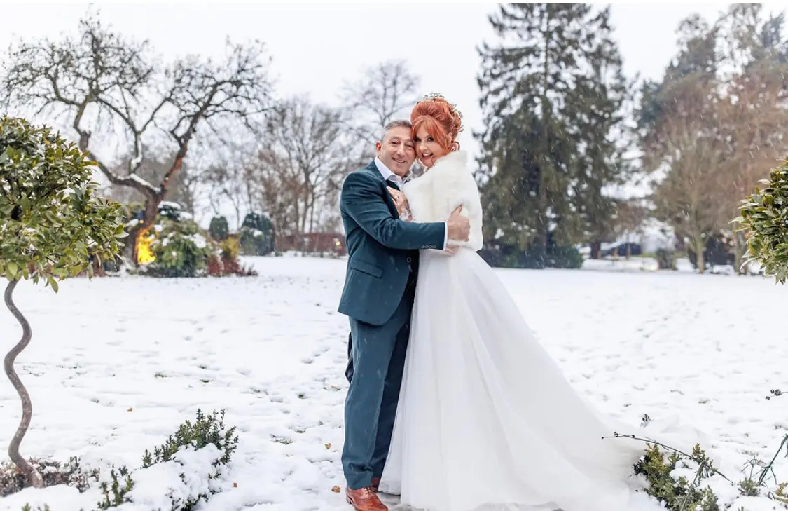 Real Bride in Bishop Sleeve A-Line Wedding Gown Called Joanne by Rebecca Ingram
