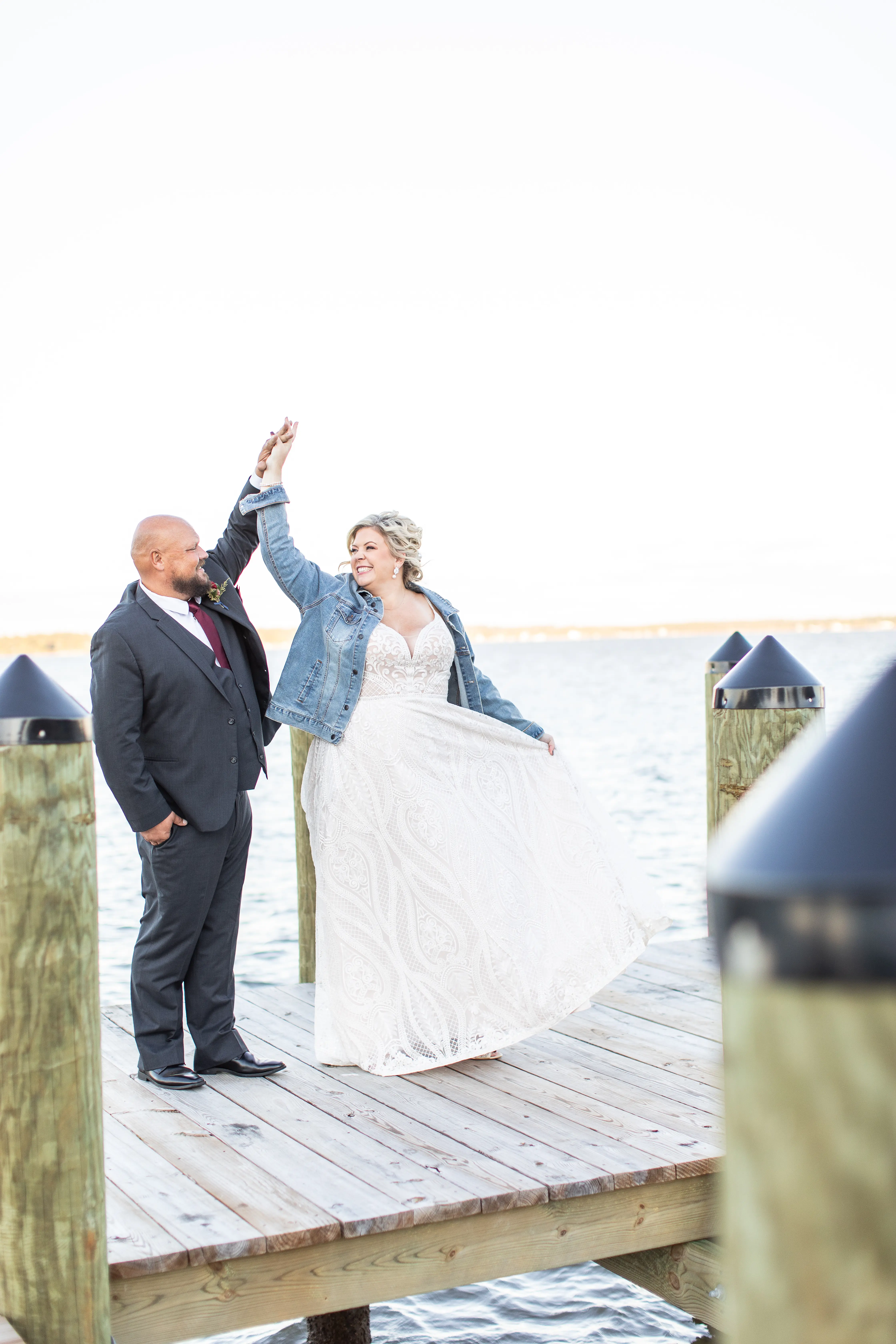 Bride In Unique A-Line Wedding Dress Called Roxanne By Sottero And Midgley With Groom