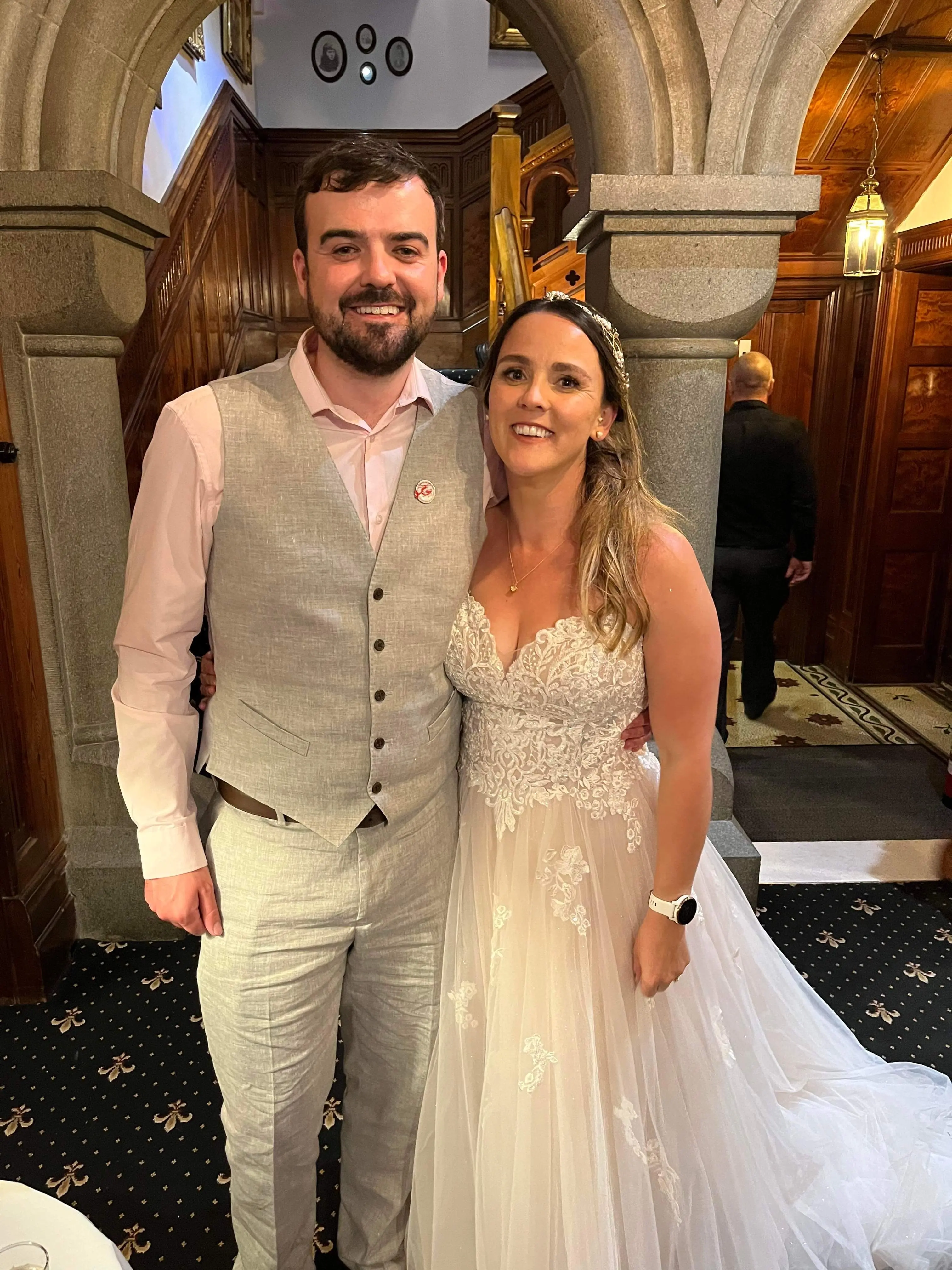 Groom With Bride Wearing A-Line Spaghetti Strap Wedding Dress Marisol By Rebecca Ingram