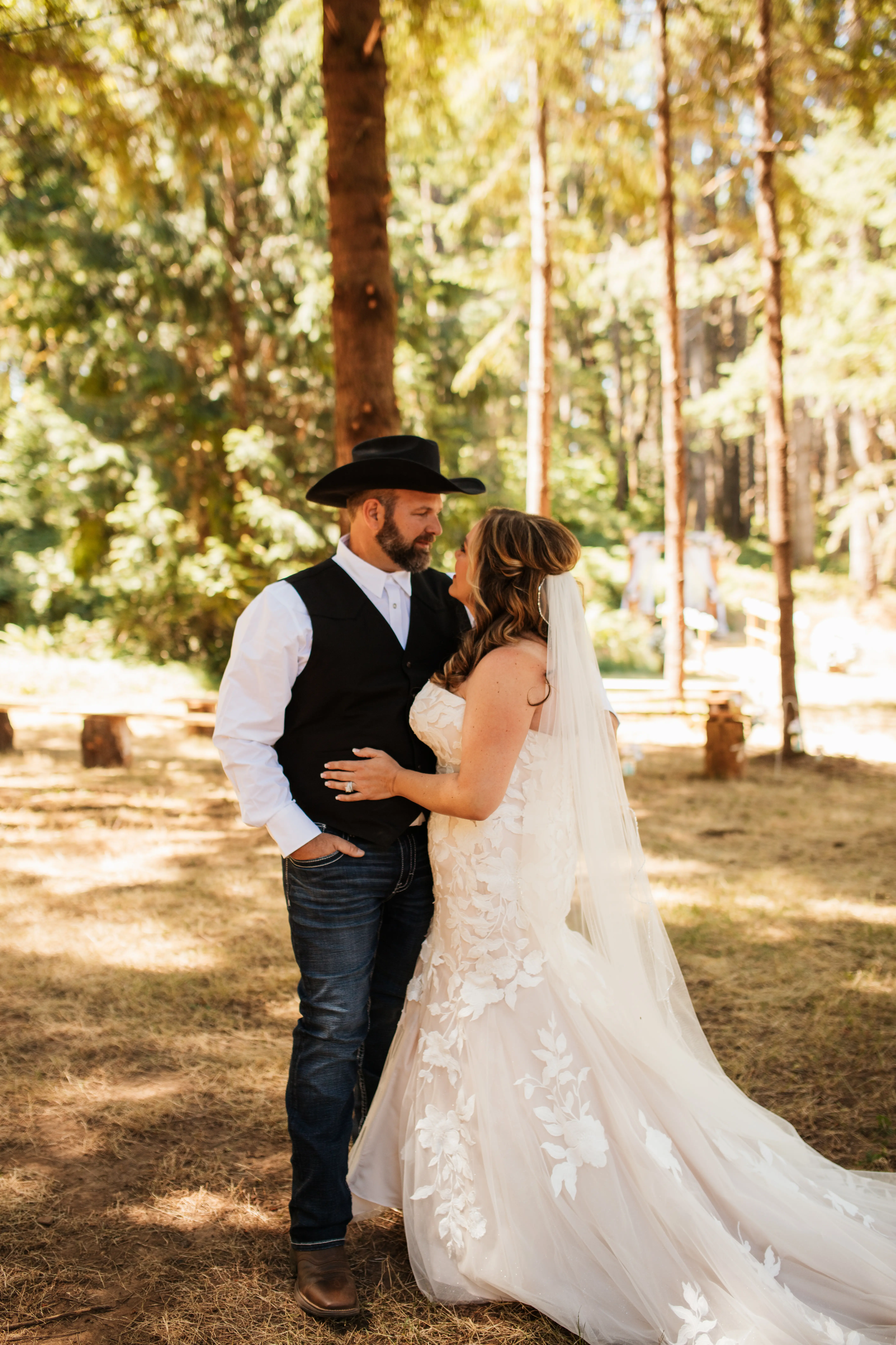 Bride wearing Hattie wedding dress by Rebecca Ingram looking at her husband