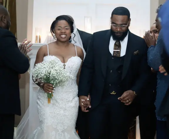 Bride wearing Lace Mermaid Wedding Dress called Alistaire by Maggie Sottero with her groom