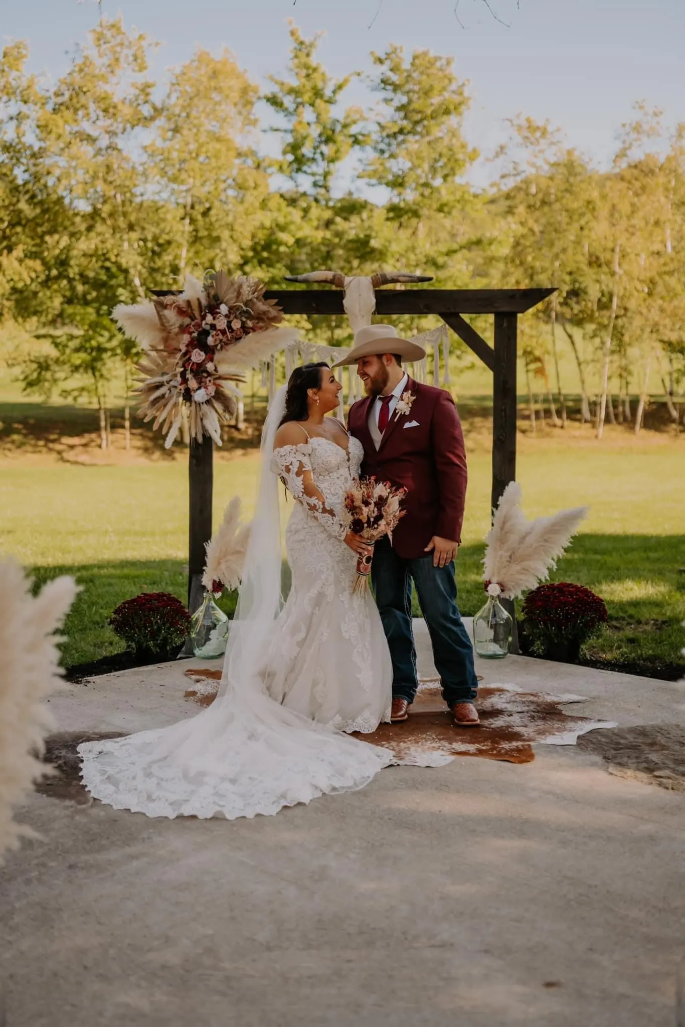 Bride wearing Fiona by Maggie Sottero beside her husband