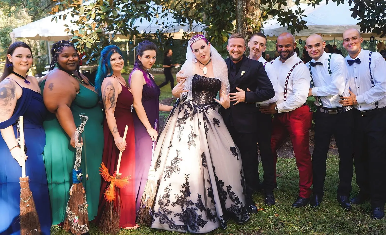 Bride Wearing Black Lace Wedding Dress Called Norvinia By Sottero and Midgley With Wedding Party