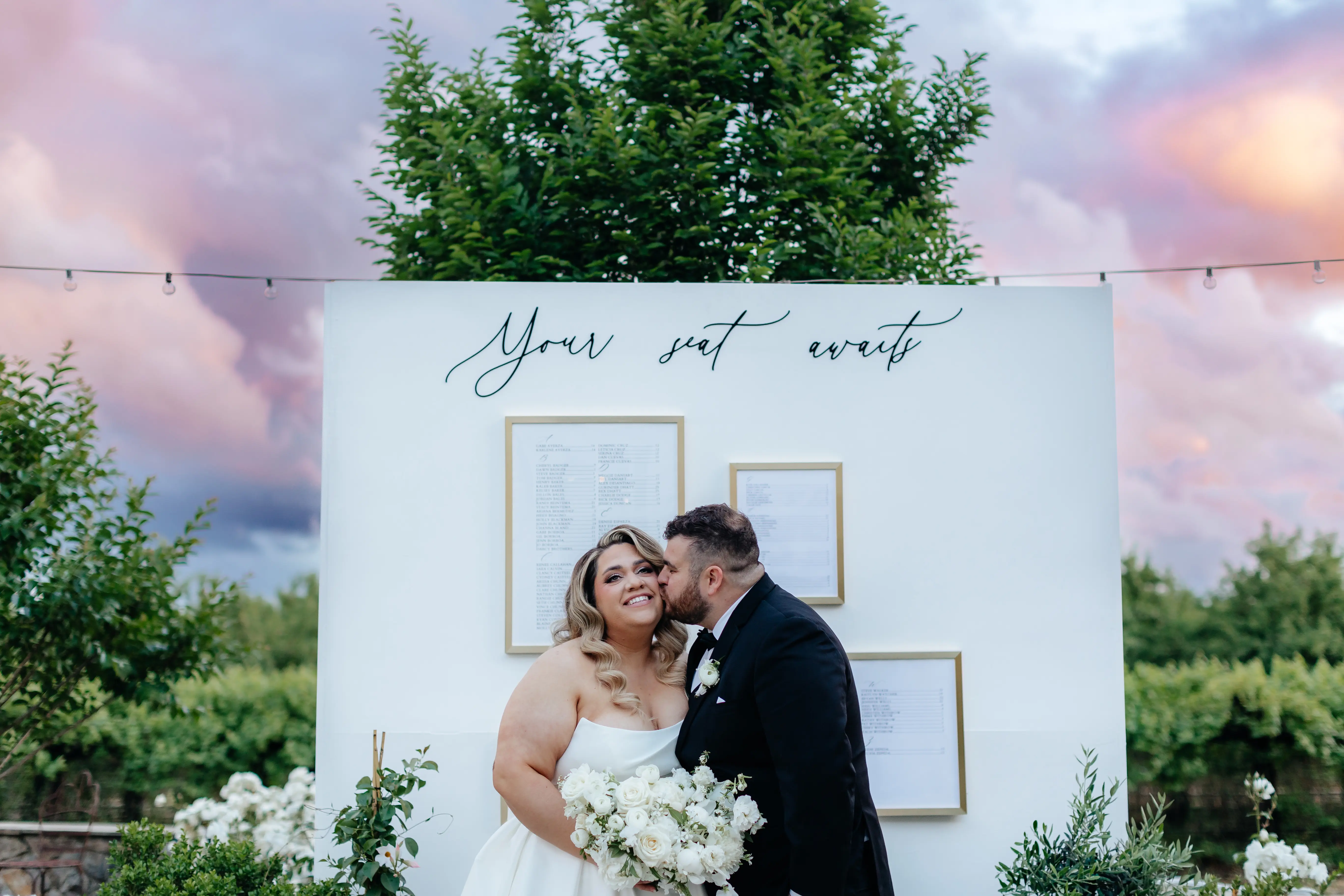 Bride wearing Aspen by Sottero and Midgley being kissed by her husband