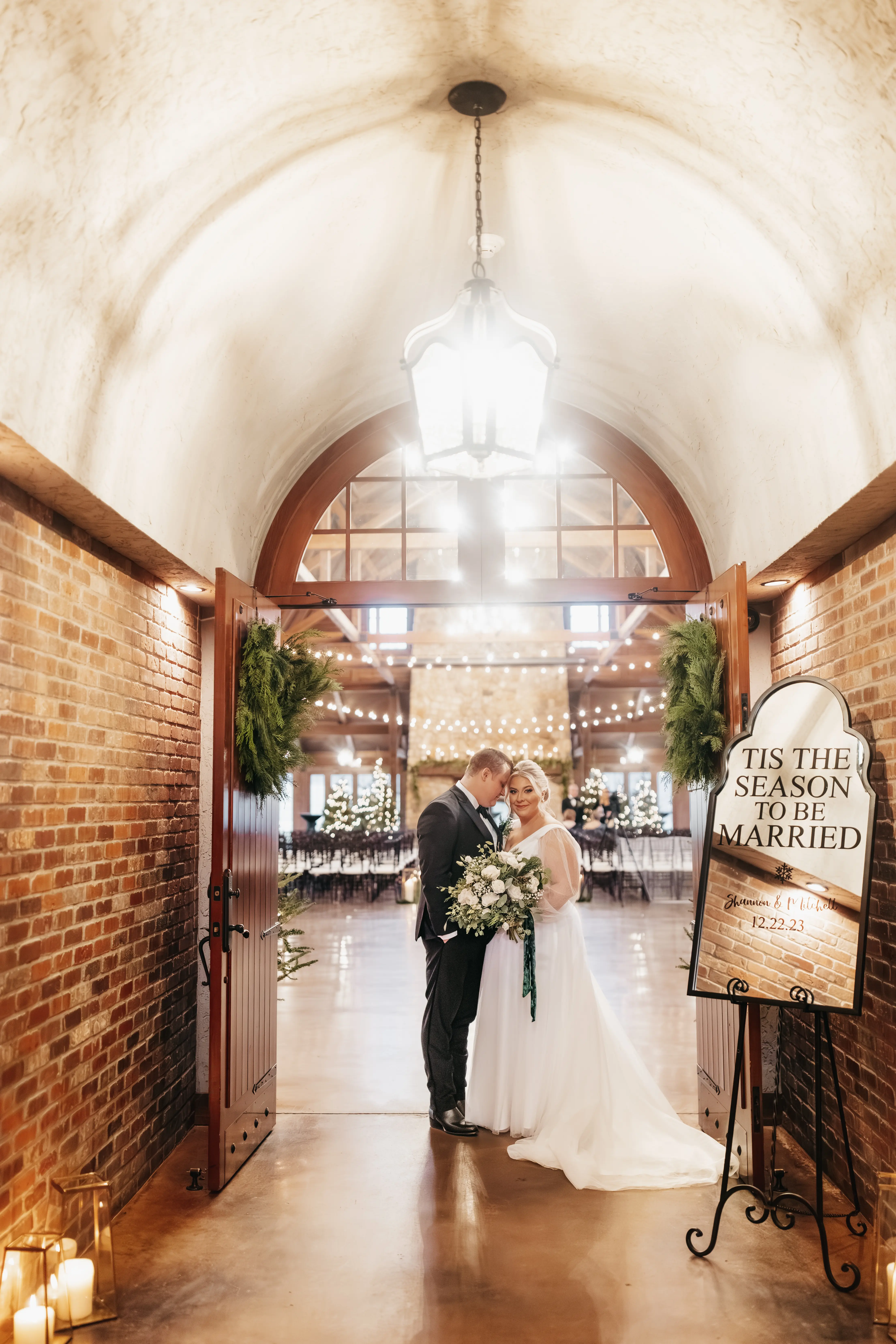 Bride wearing Joanne wedding dress by Rebecca Ingram with her husband