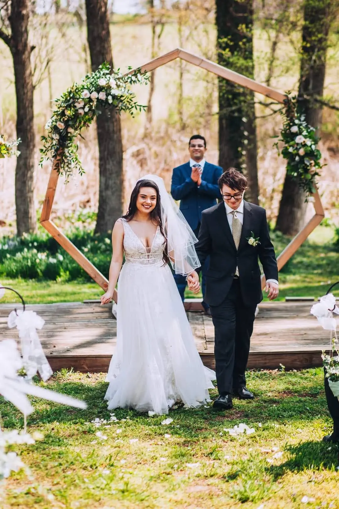 Groom With Bride Wearing Lace A-Line Wedding Dress Raelynn By Rebecca Ingram