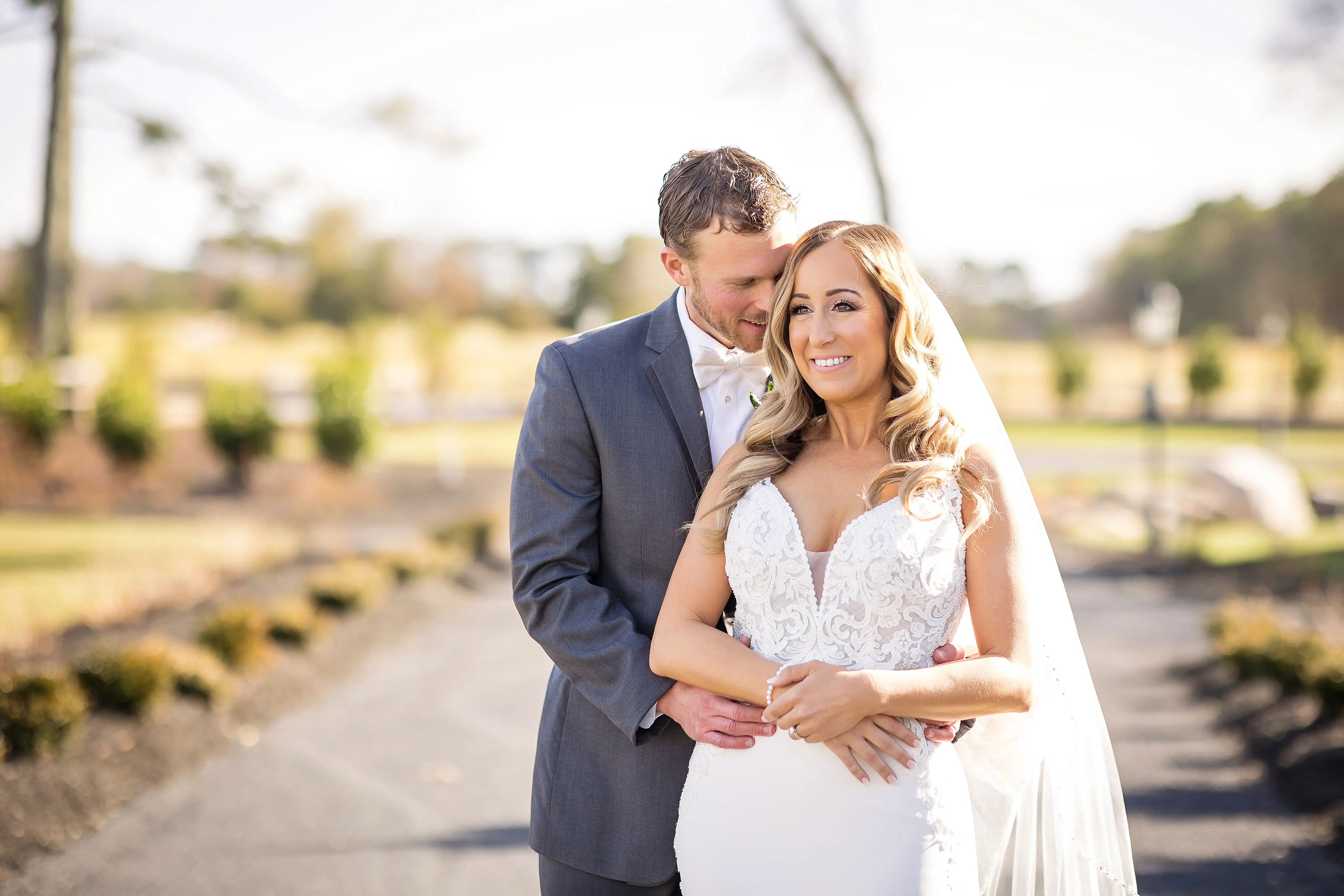 Bride Wearing Lace Mermaid Wedding Gown Called Nikki By Maggie Sottero With Groom