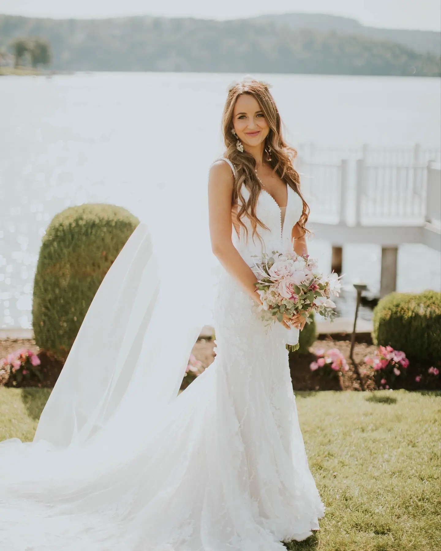 Bride in Mermaid Wedding Dress with 3-D Floral Motifs Called Cruz by Sottero & Midgley