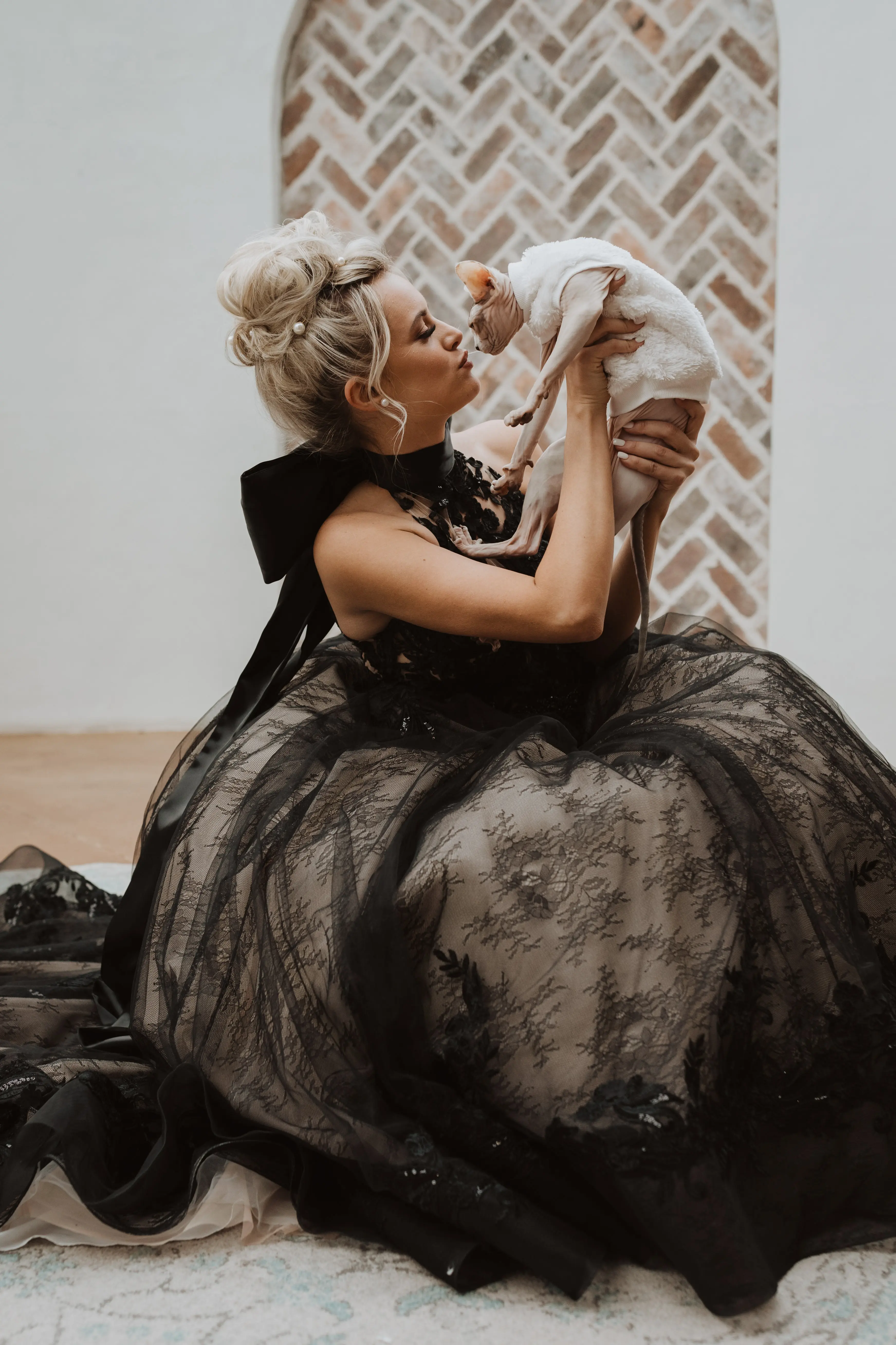 Real Bride in Beautiful Black Ball Gown Wedding Dress with Contrasting Layers of Tulle, Lace Motifs, and Chantilly Lace Called Zander by Sottero & Midgley