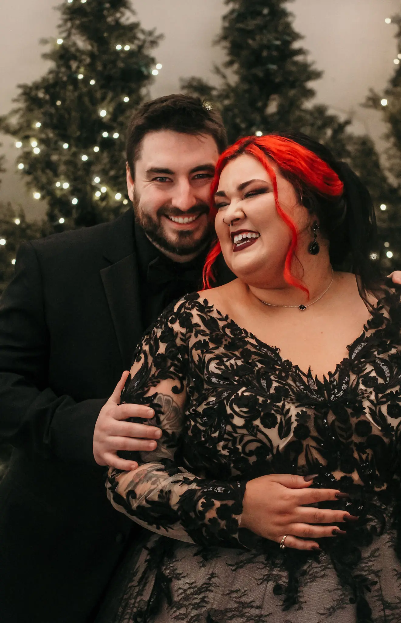 Groom With Bride In Ball Gown Wedding Dress With Black Lace Floral Sleeves Called Zander By Sottero And Midgley