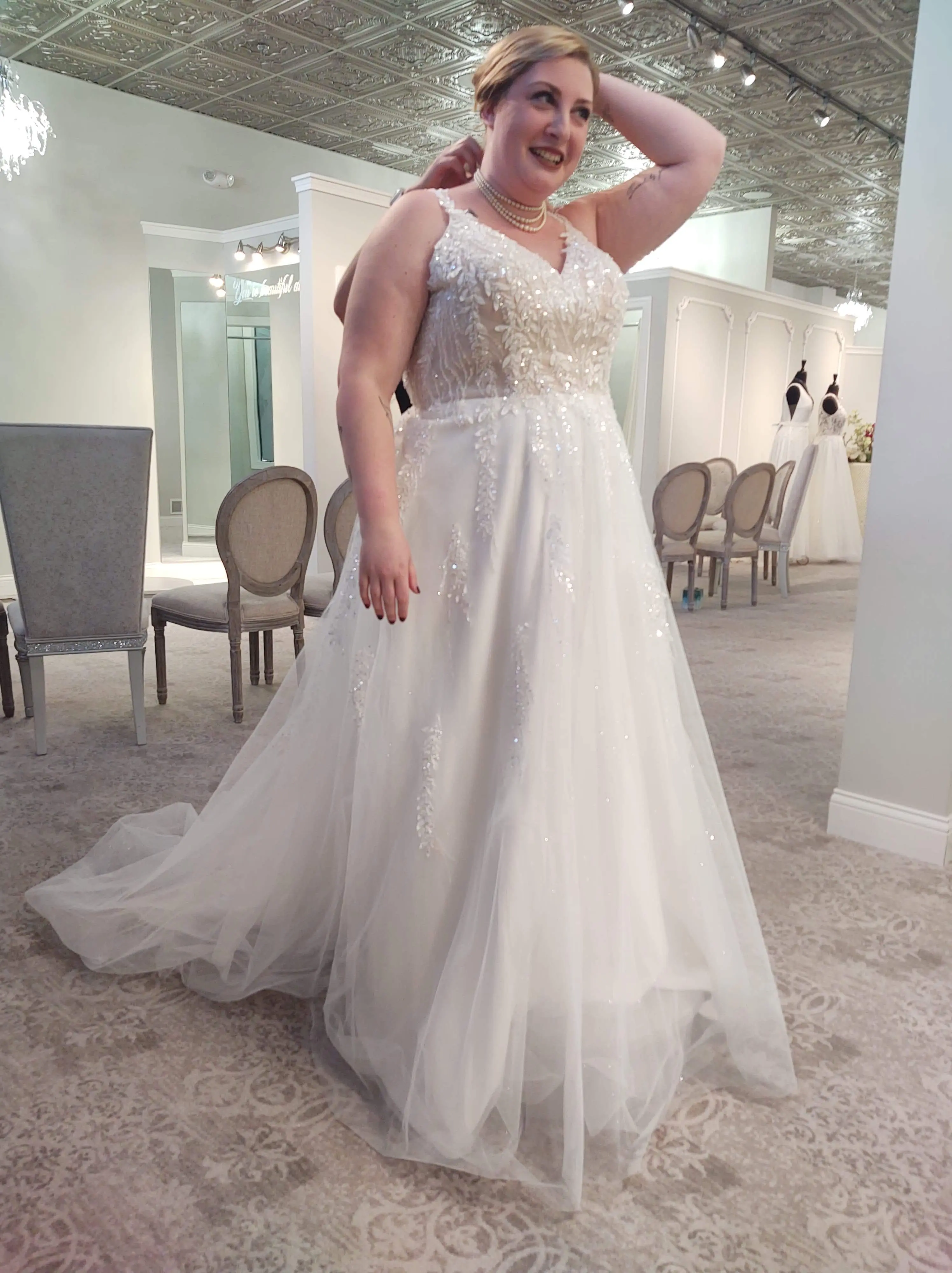 Real Bride in her "Say Yes to the Dress Moment" in Sparkly Classic Bridal Dress with Royal-Inspired Lace called Florence by Maggie Sottero