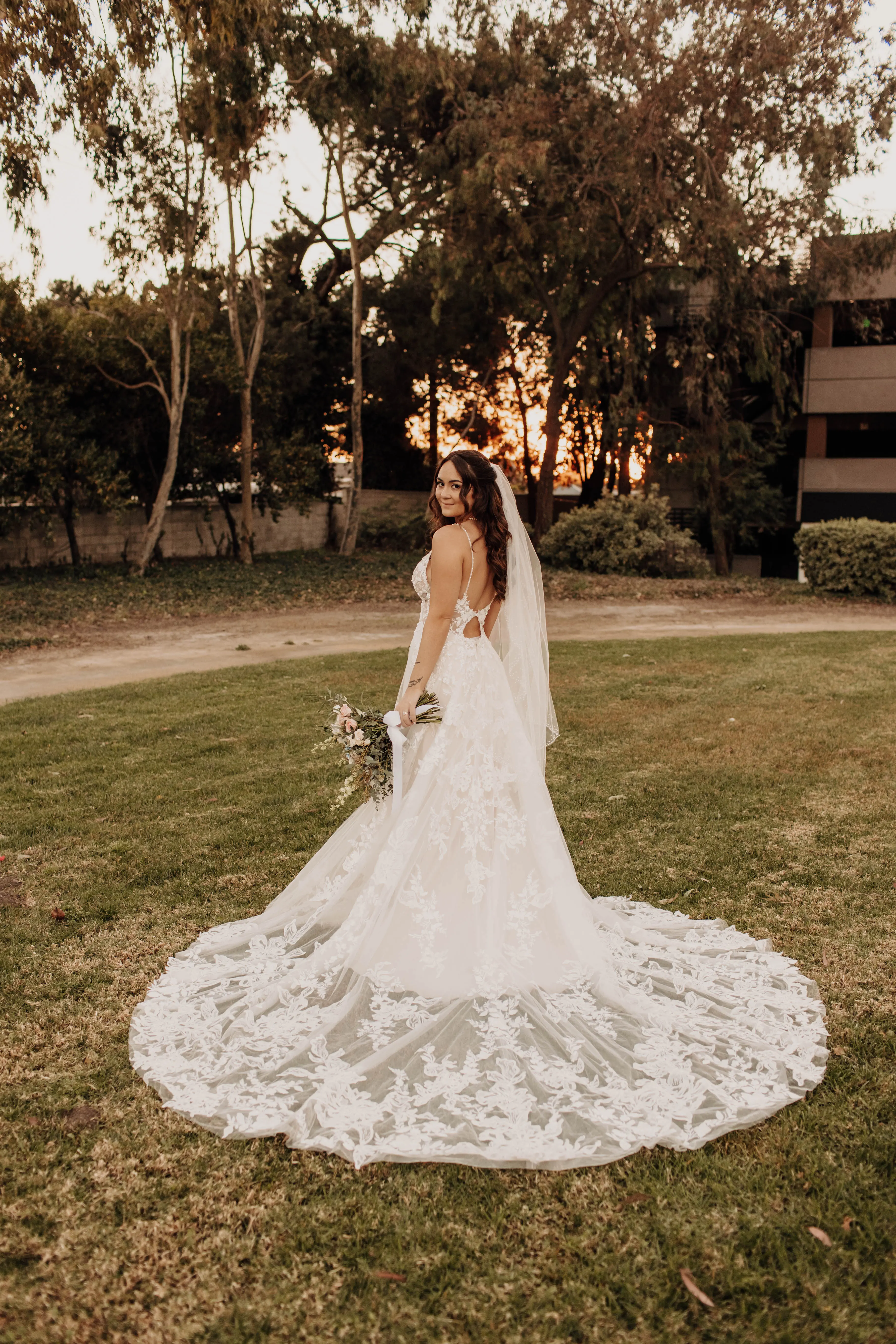 Bride wearing wedding dress called Marlow with keyhole back.