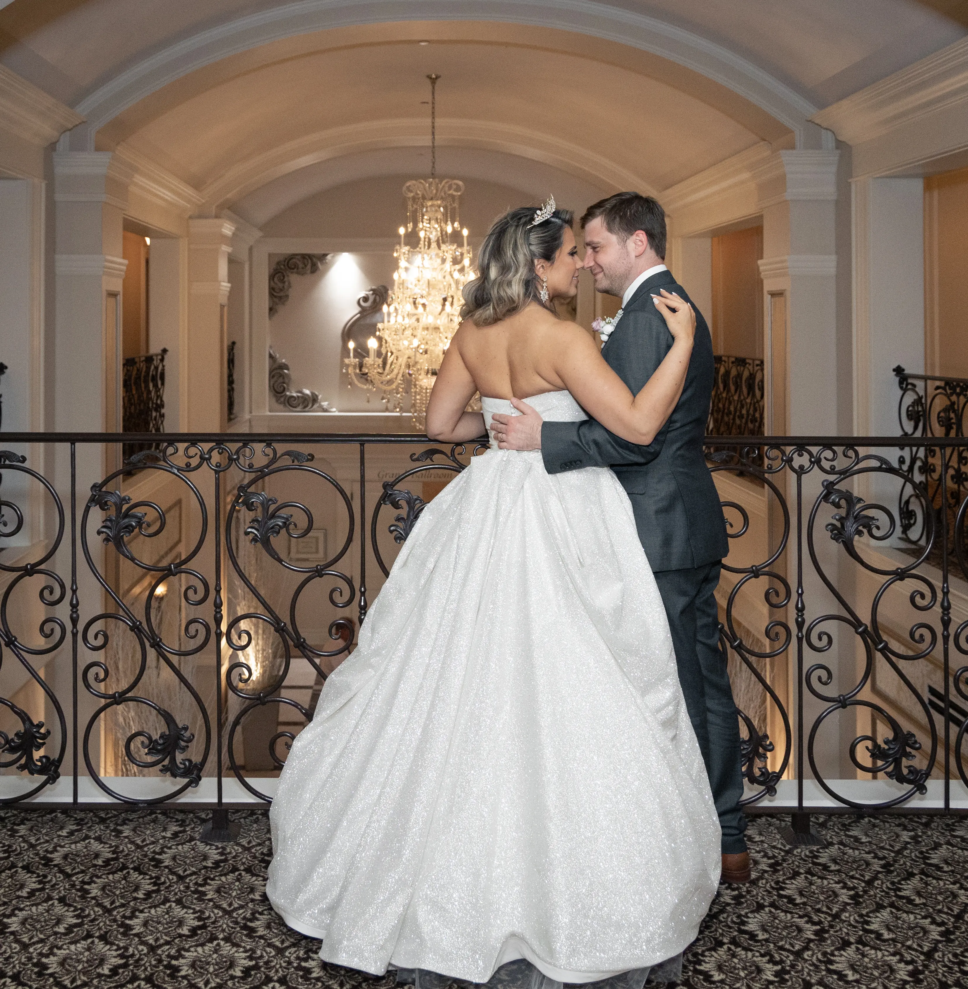 Bride wearing Anniston by Maggie Sottero smiling at her husband