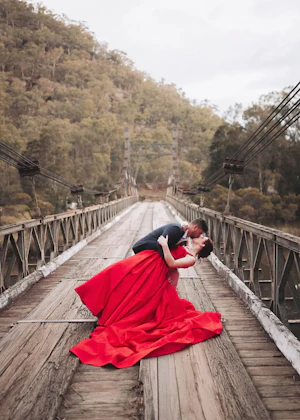 Bride In Red A-line Alera Sottero Midgley With Groom