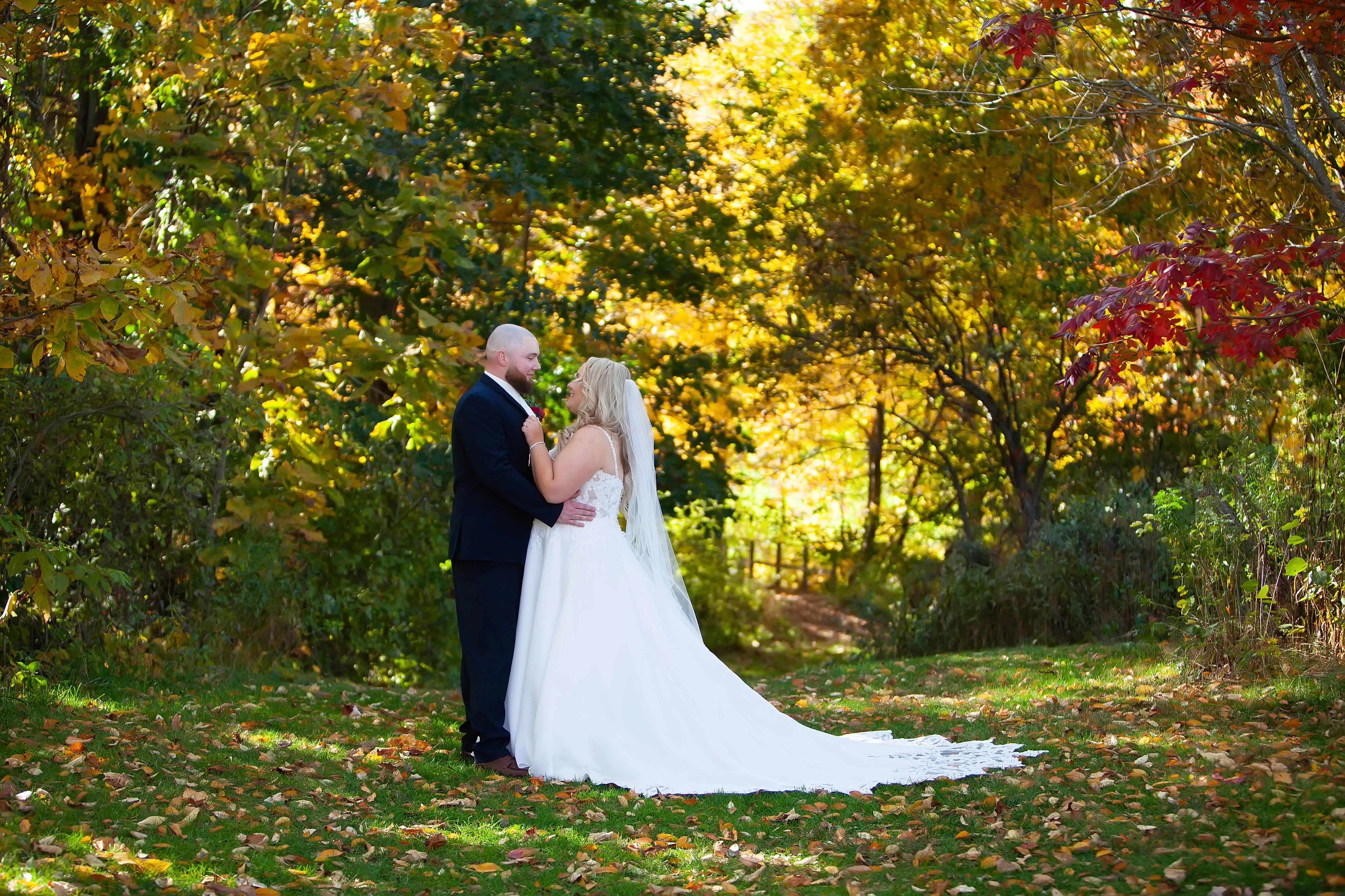 Bride Wearing Lace Ballgown Wedding Dress Called Savannah By Maggie Sottero Holding Groom