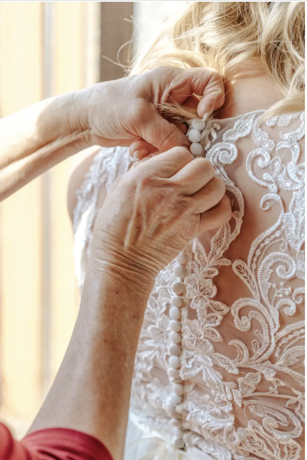 Bride In Lace Wedding Dress Called Tasha By Rebecca Ingram Getting Buttoned Up