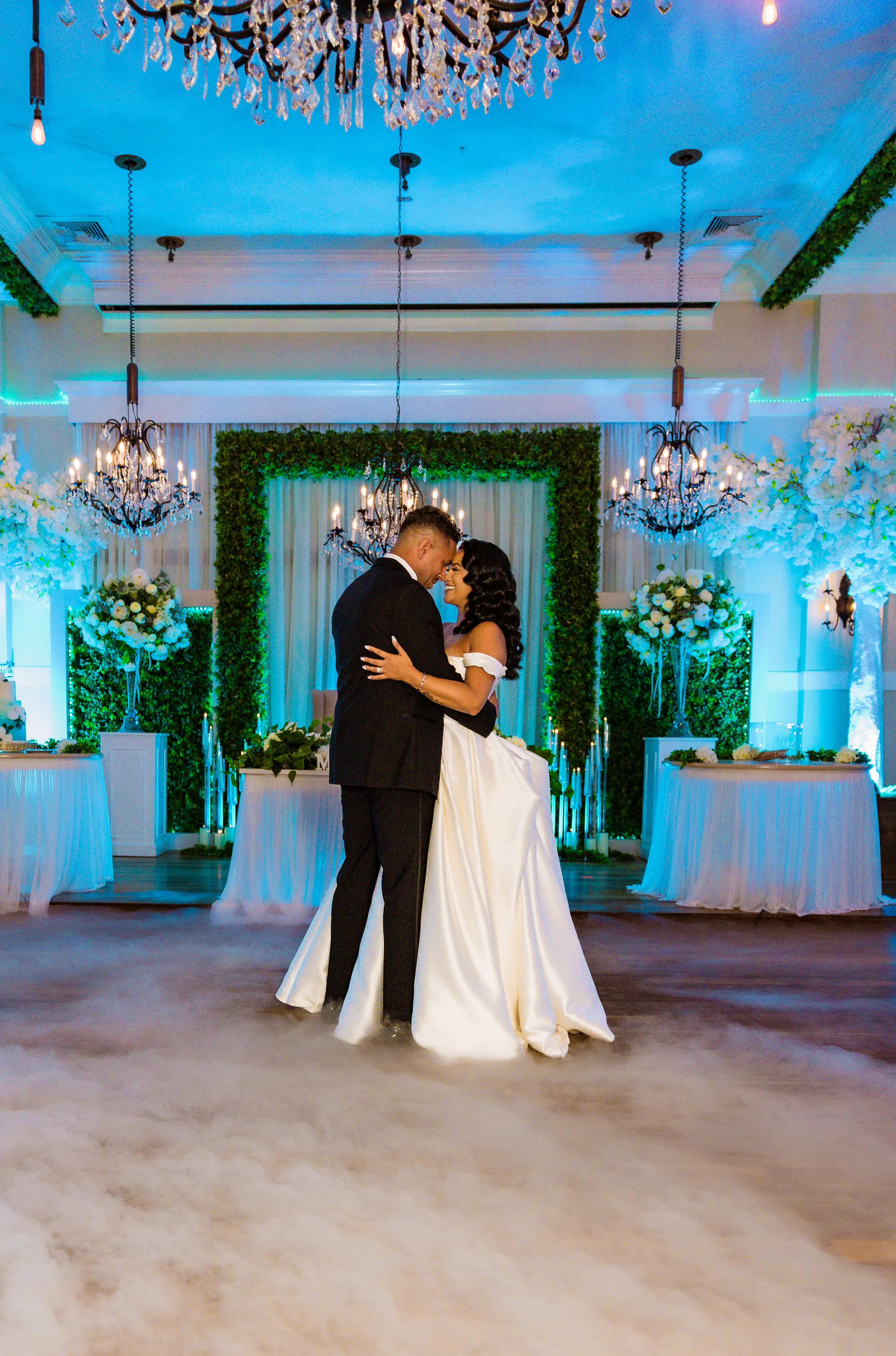 Bride wearing Zinaida by Maggie Sottero dancing with her husband