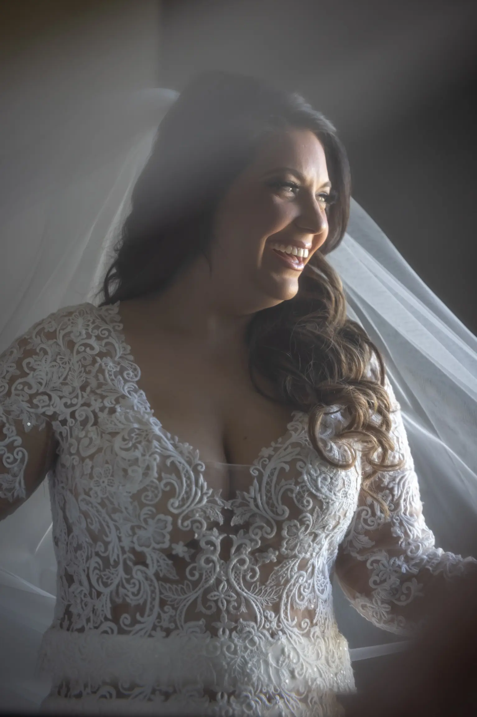 Bride Wearing Long Sleeve Sheath Wedding Dress Althea By Maggie Sottero