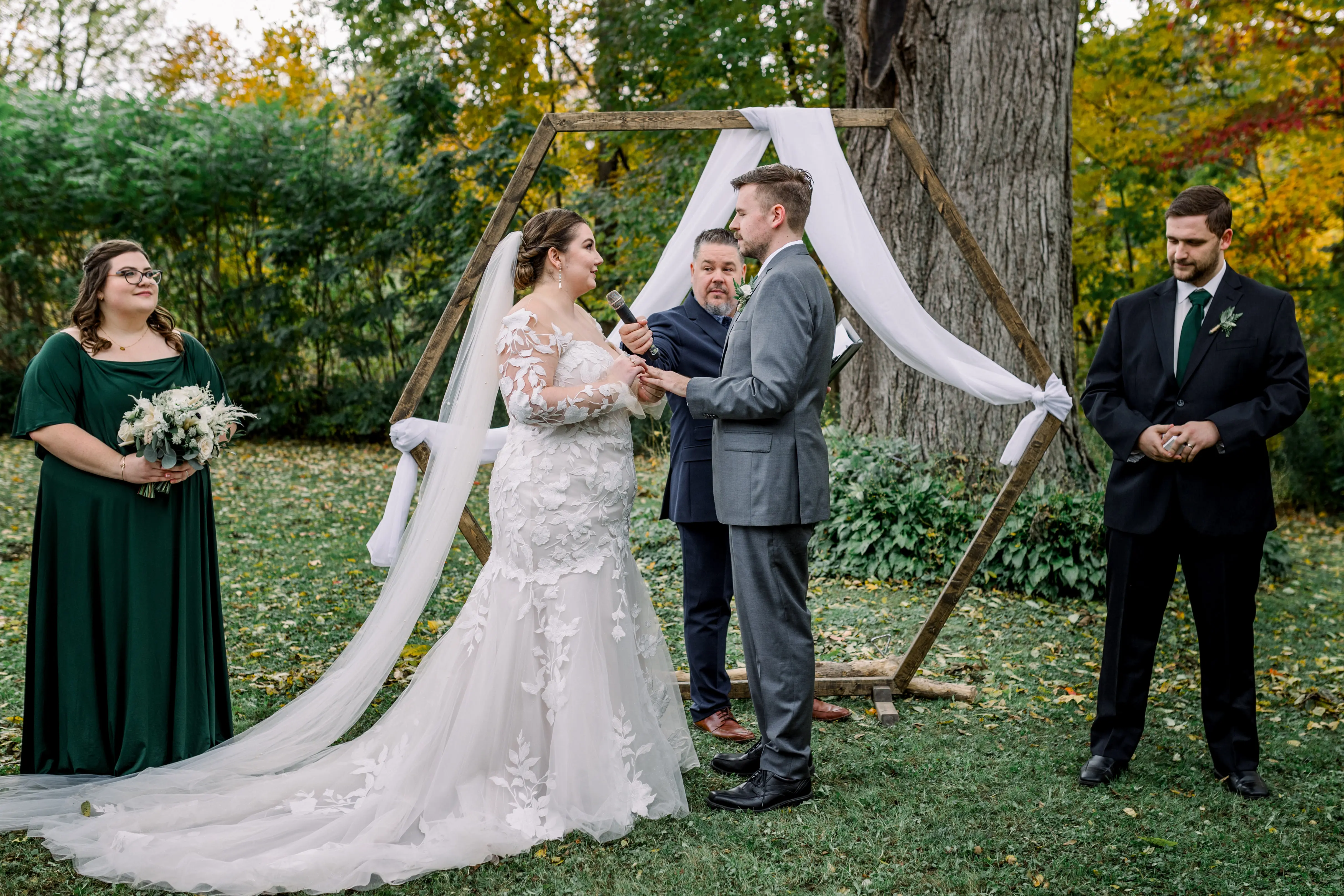 Bride wearing Hattie by Rebecca Ingram saying her vows