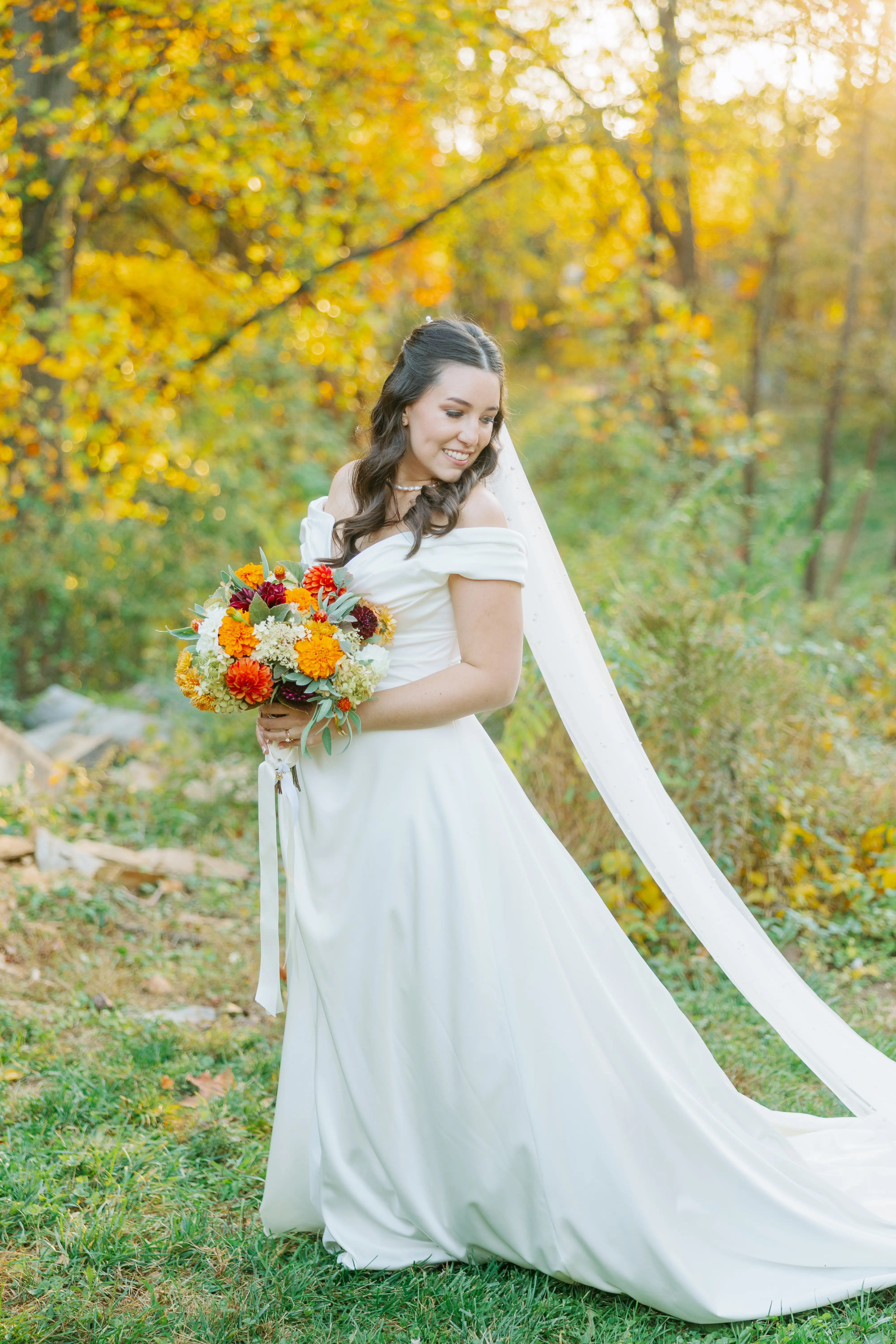 Bride Wearing Satin Aline Wedding Dress Called Ekaterina By Maggie Sottero In A Forest